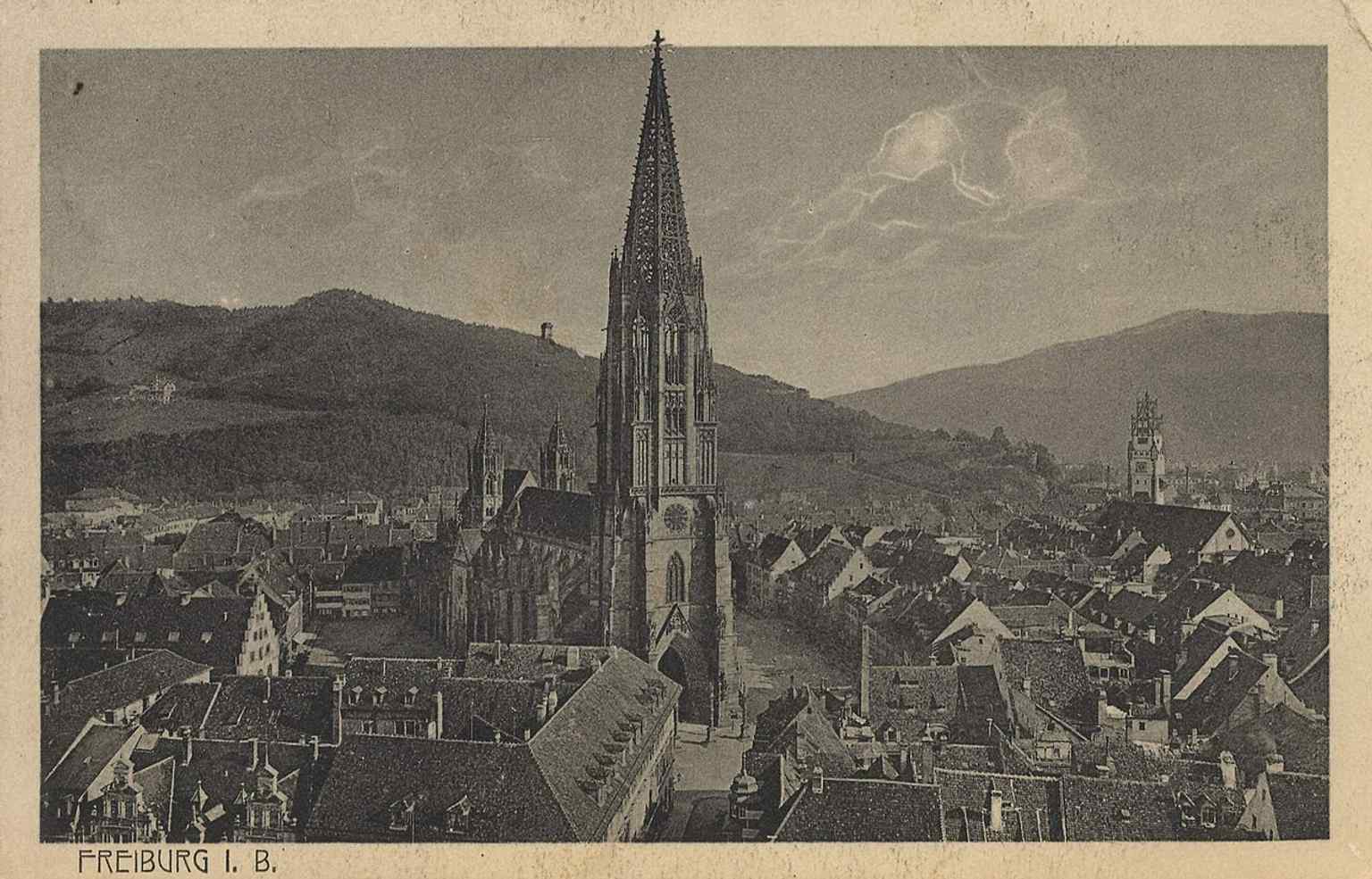 An early 20th-century city view with the Minster dominating Freiburg’s skyline above the old town.