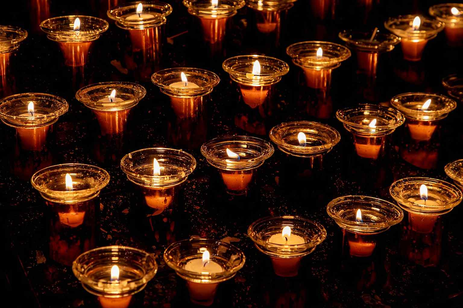 Votive candles inside the Minster, giving a sense of the living church beyond its famous architecture.