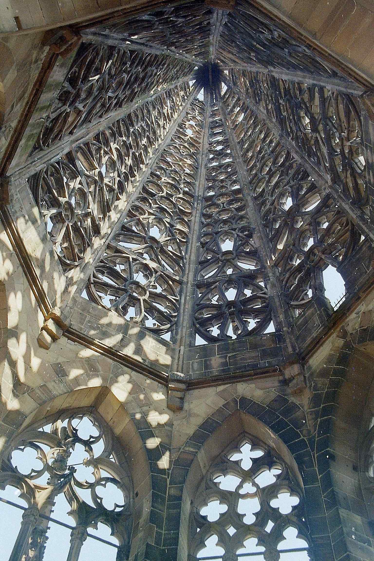 Inside the tower’s octagonal chamber, where the slender Gothic tower transitions into its openwork spire.