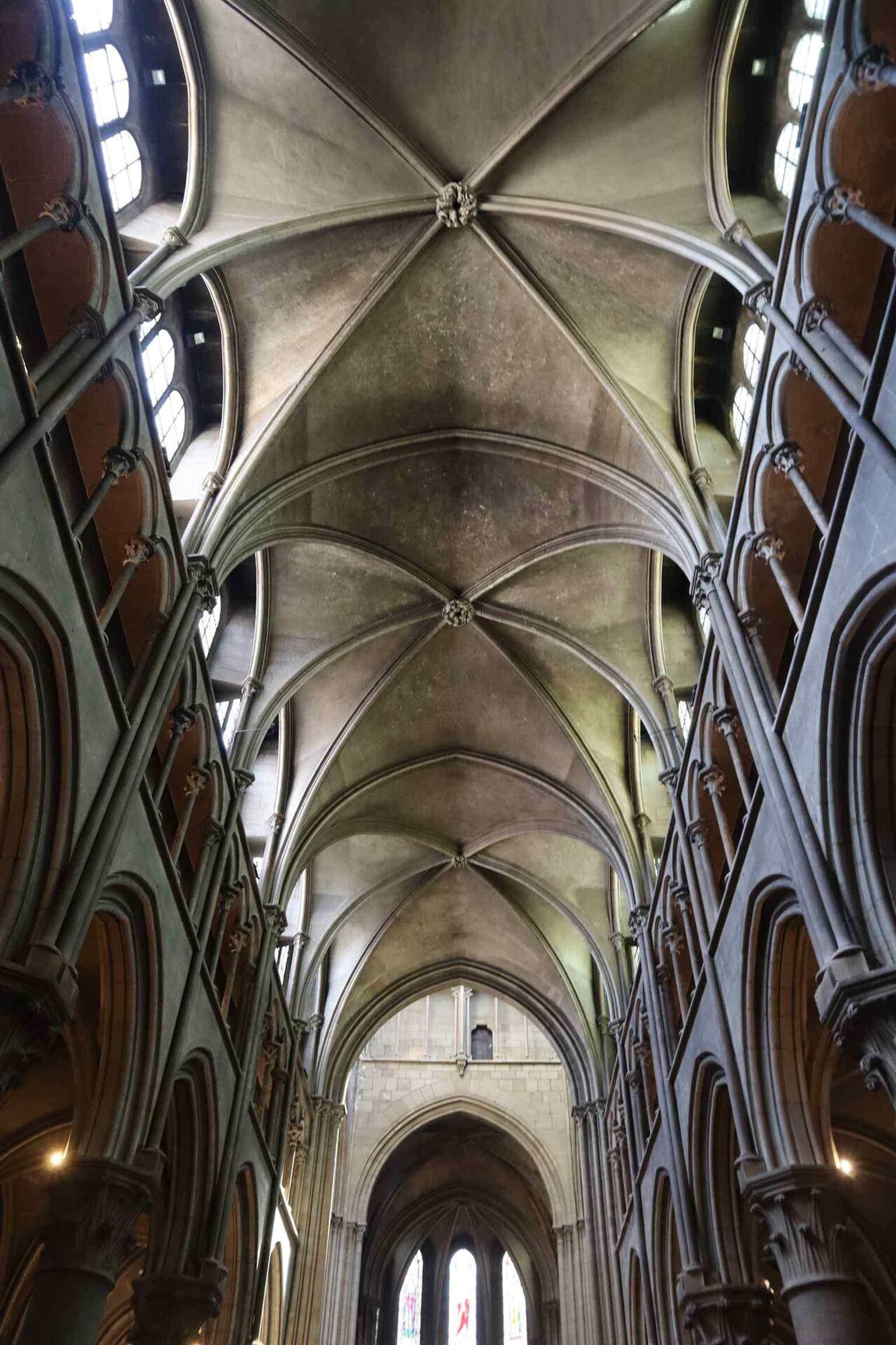 One of the many vibrant stained-glass windows, some of which were created by Édouard Didron from 1874 onwards, inspired by the church's original 13th-century designs.