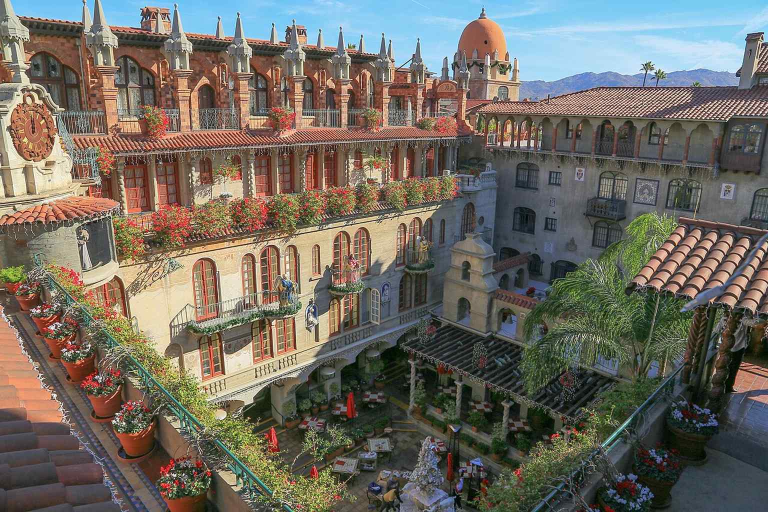 The main courtyard captures the Mission Inn’s maze of balconies and arcades, a hallmark of the building’s many additions over time.
