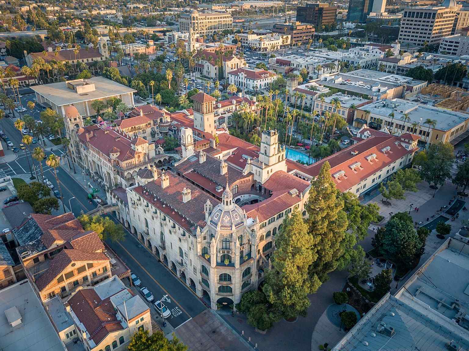 An elevated look at the Mission Inn complex reveals its jumble of wings, towers, and roofs built in many different styles.