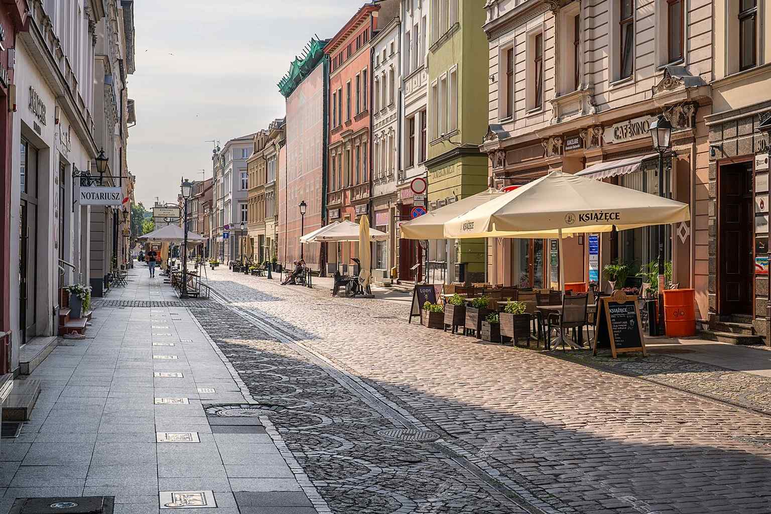 The Bydgoszcz Autographs Alley embedded in Długa Street — a 2007 project that turns the pavement into a roll call of notable city visitors and residents.