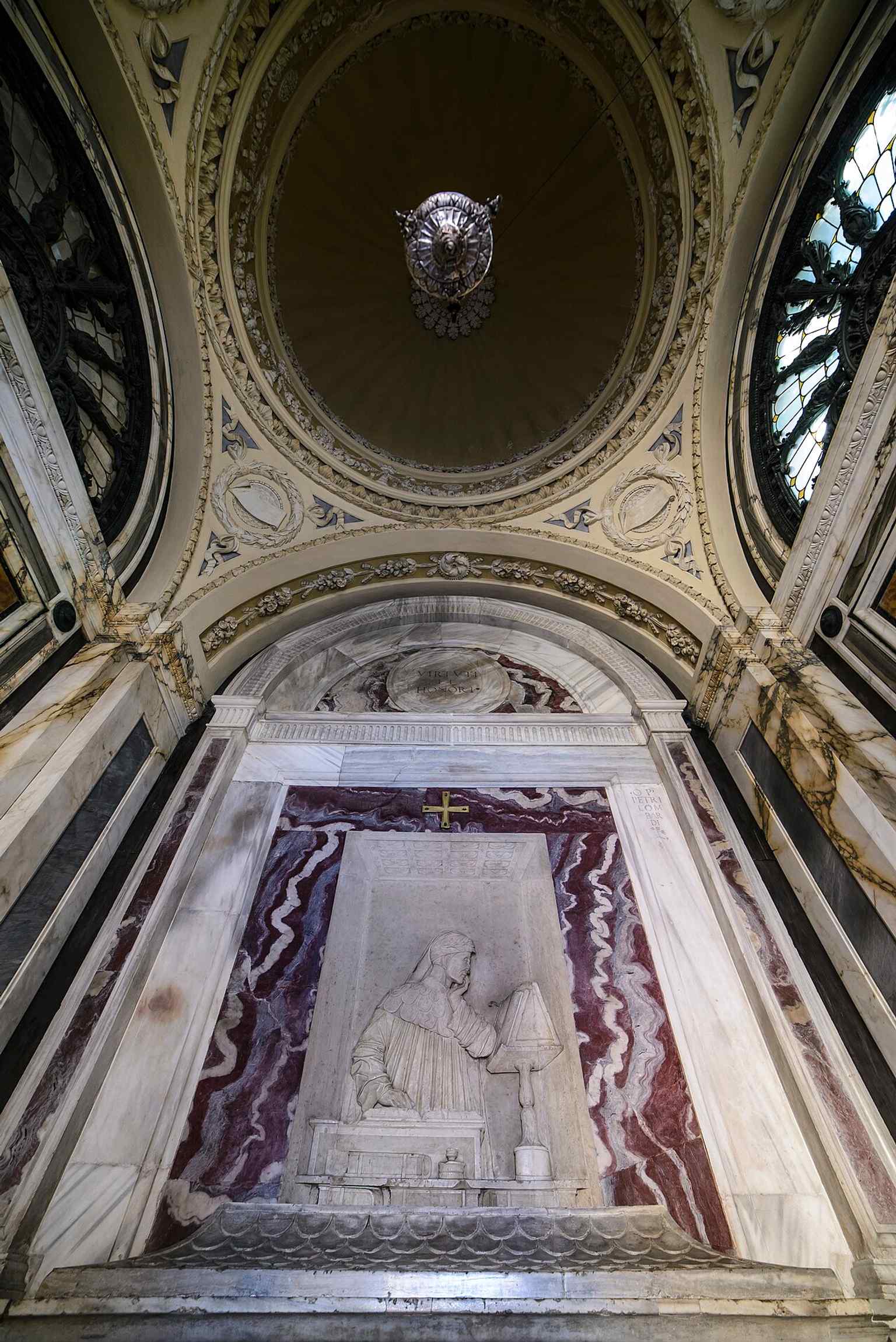 A full interior shot of the mausoleum, emphasizing the intimate, chapel-like space around Dante’s burial.