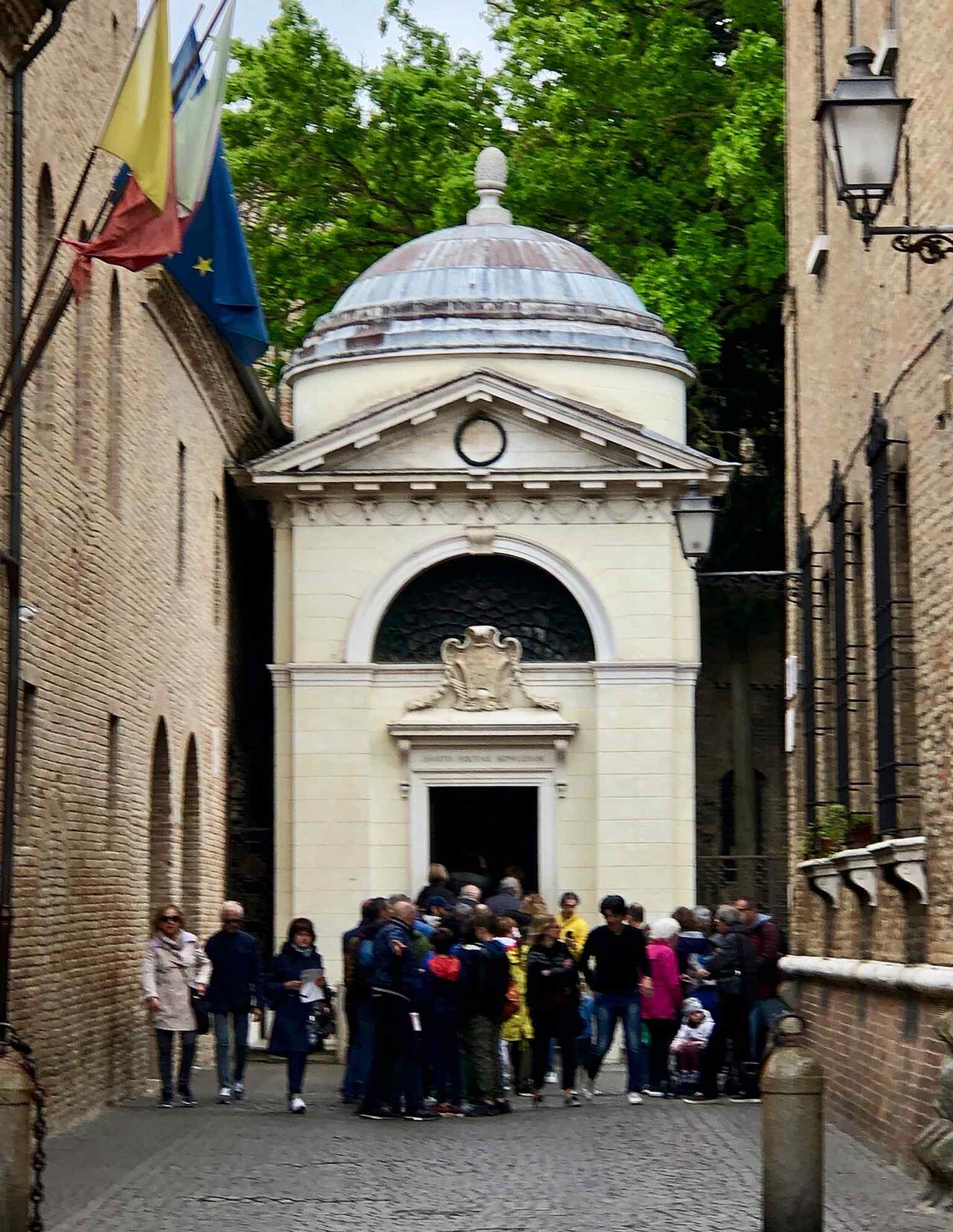 The Dante zone and tomb in a wider historic context, illustrating the quiet garden and protected setting around the monument.