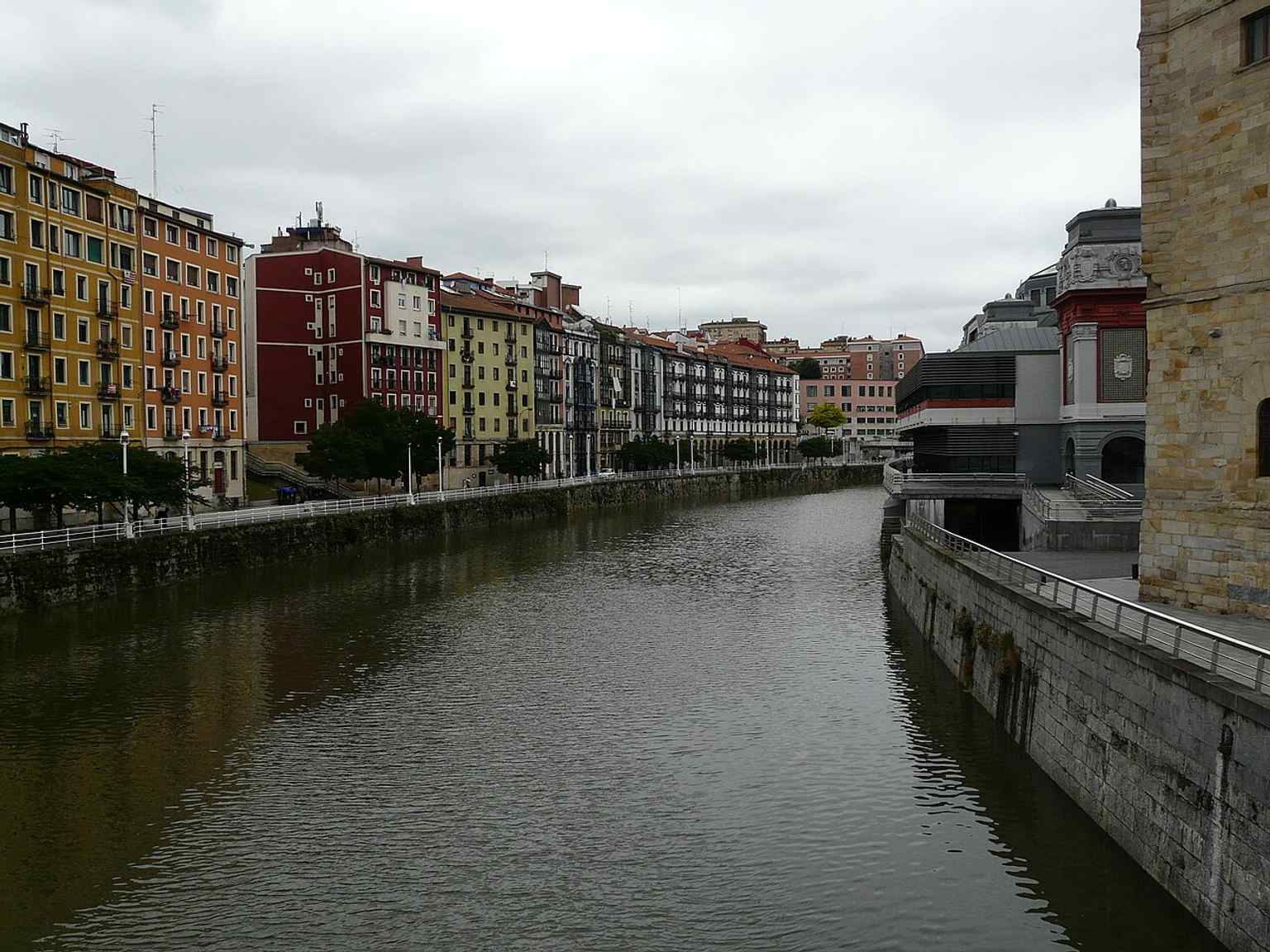 A view from San Antón Bridge looking toward the riverfront, placing the market in the wider Bilbao landscape.