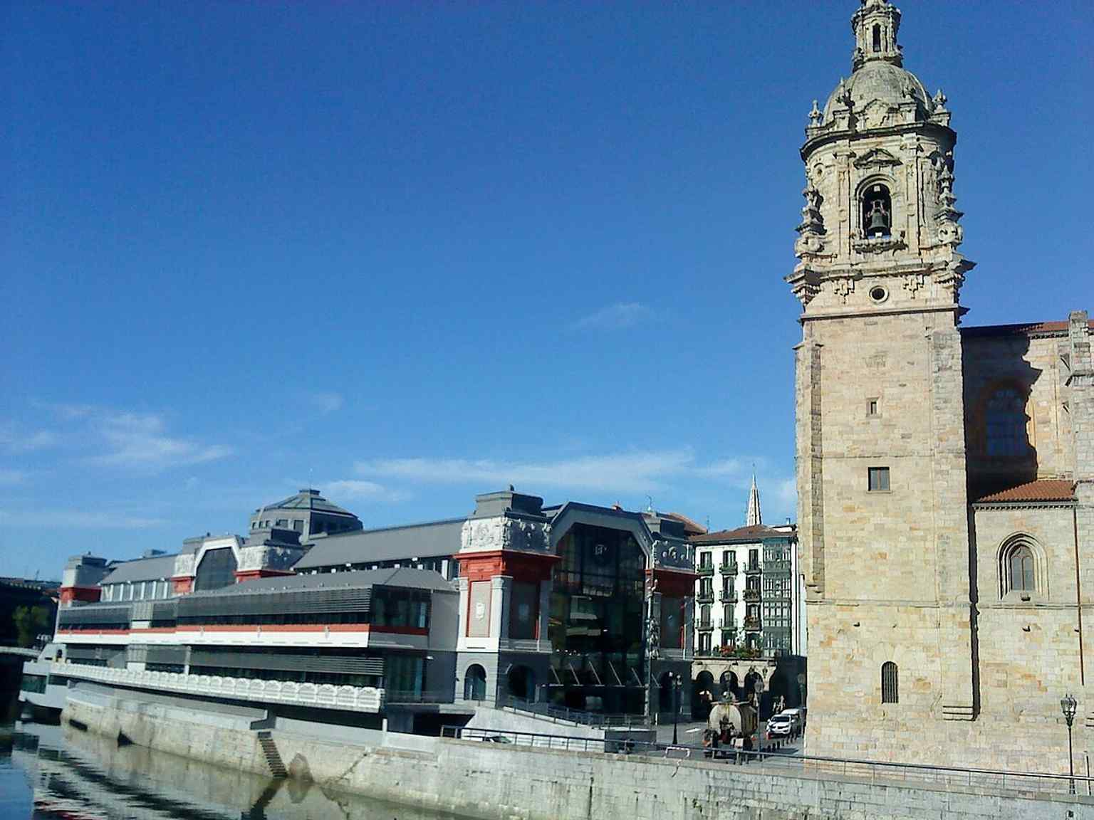 The market with San Antón Church next door, exactly the landmark pairing that shaped this site for centuries.