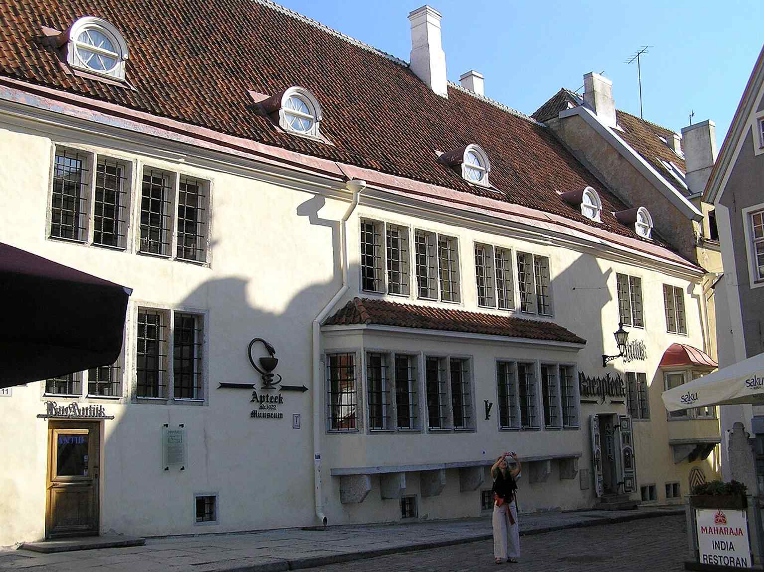 The pharmacy’s historic façade on Town Hall Square, where Raeapteek has operated from the same building since the early 1400s.