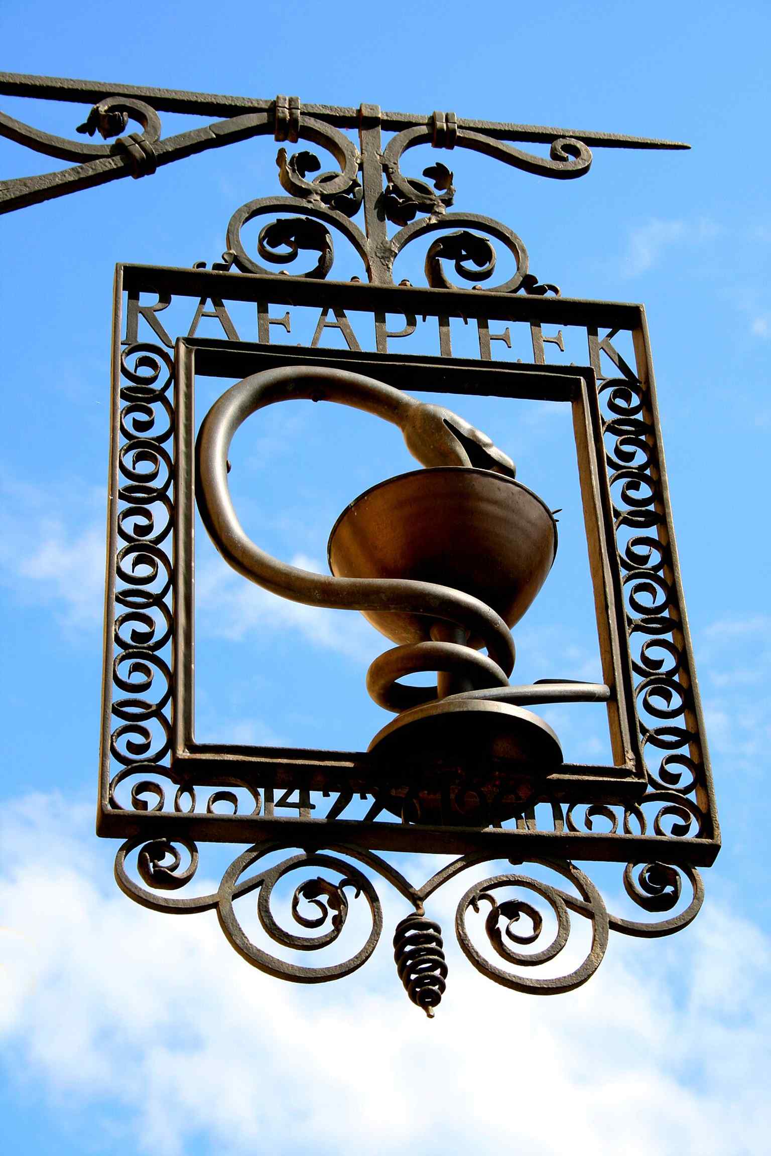 The old pharmacy logo, a small but telling detail from one of Europe’s oldest continuously running pharmacies.