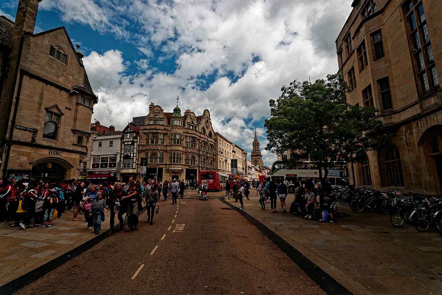 Looking west from Cornmarket toward Carfax and Queen Street, where the street meets Oxford’s main pedestrian shopping area.