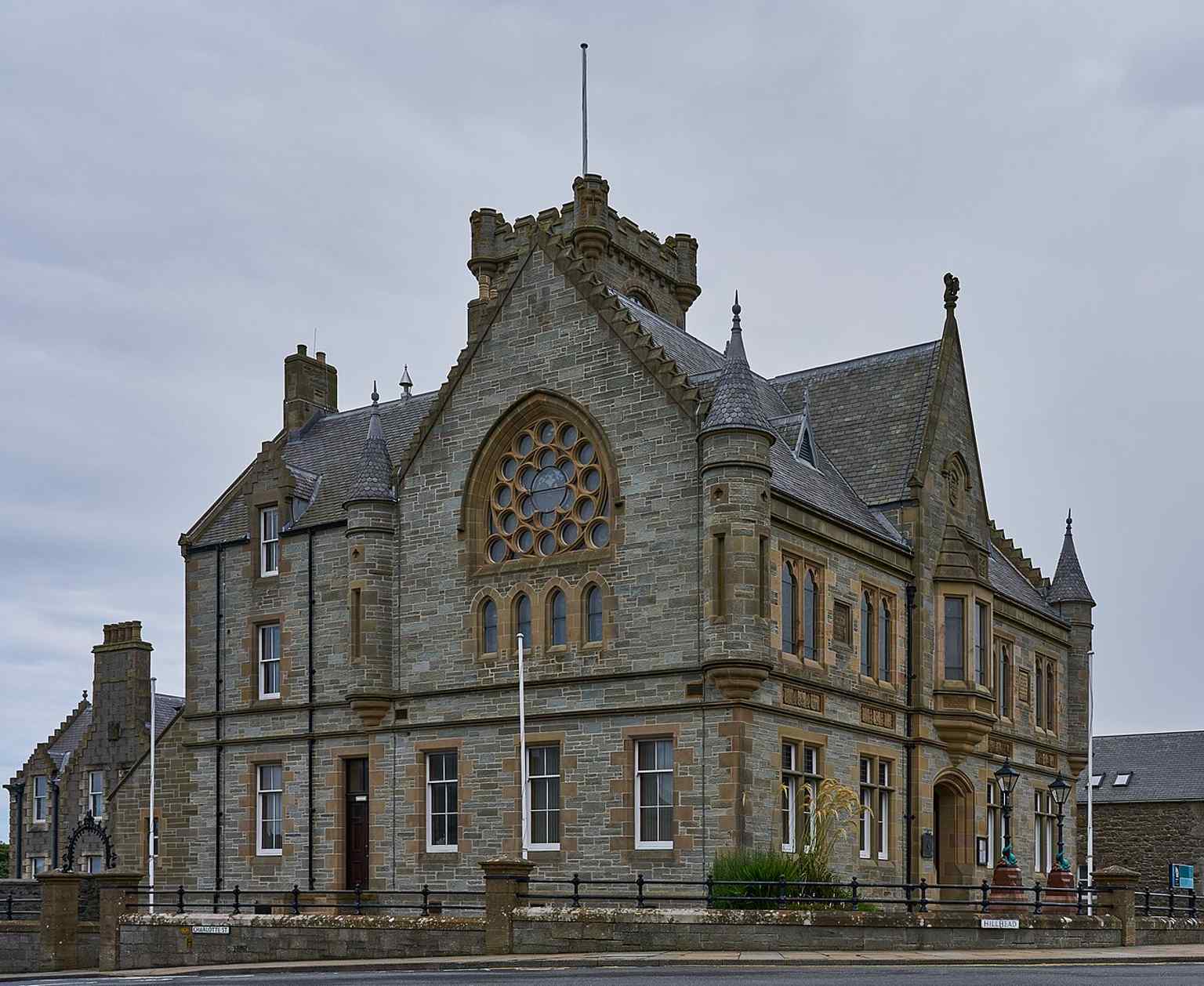Northwest view of Lerwick Town Hall, the Scottish Baronial civic building on Hillhead that became the council headquarters in 1883.