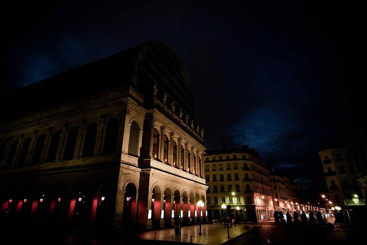 The Opera de Lyon at dawn, showing Jean Nouvel’s striking glass crown above the historic 19th-century shell.