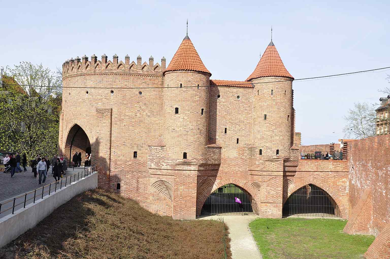 West-side view of the Barbican, useful for showing its rounded bastion shape and the reconstructed outer approach.