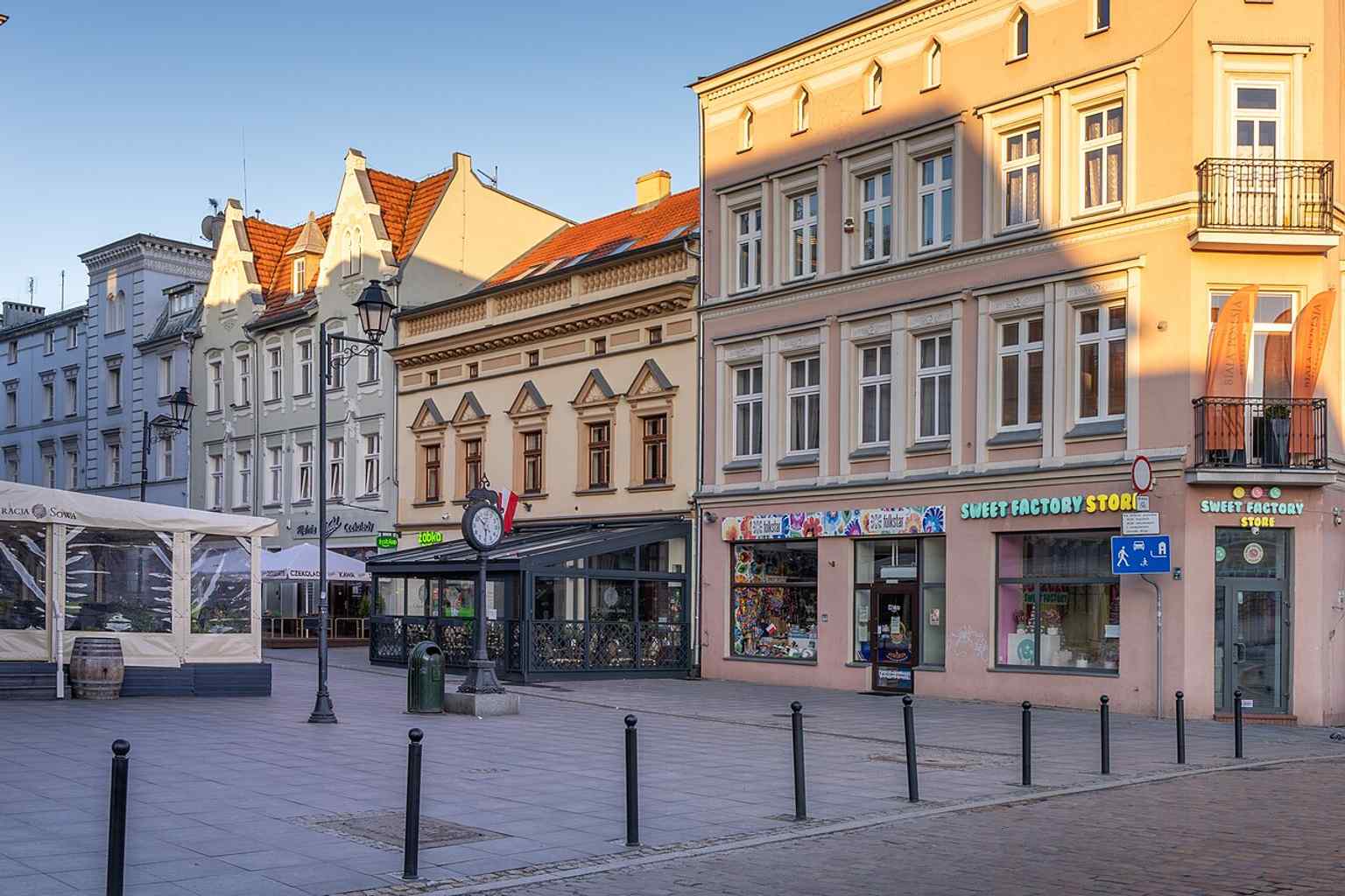 The western frontage of Mostowa Street, one of the few historic sides still preserved after the wartime demolitions of 1940.