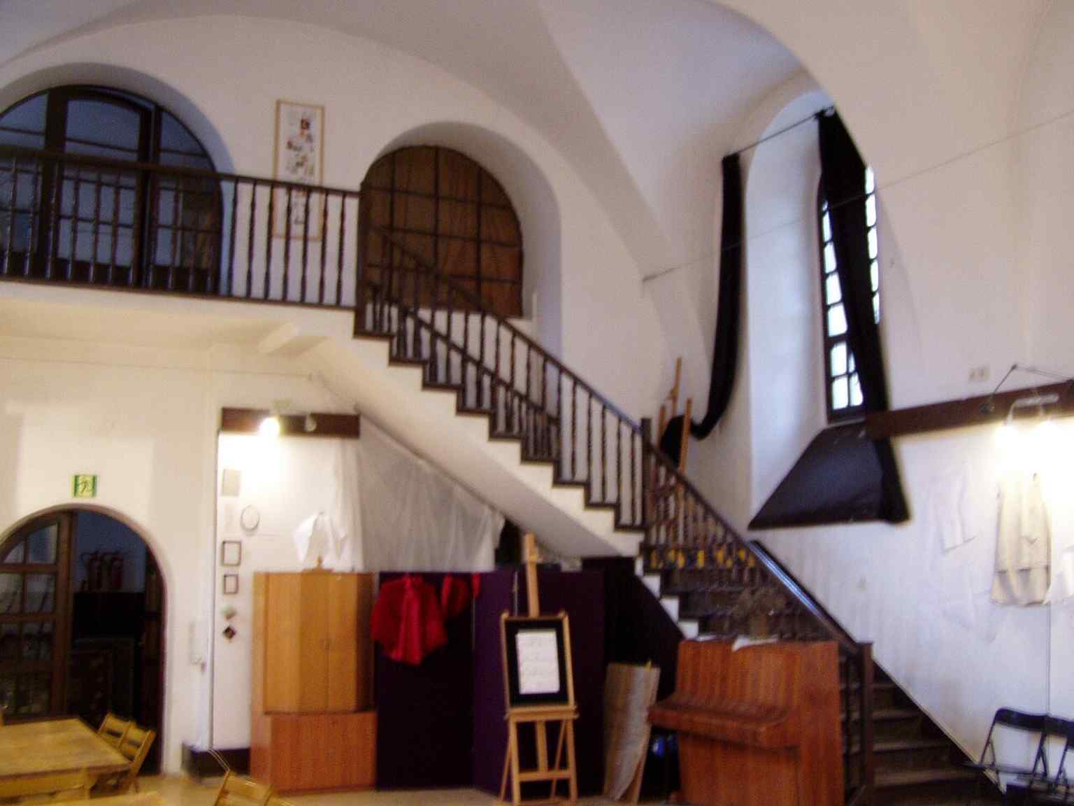 Stairs inside the building, recalling the 1827 alterations that rebuilt the roof and stair access.