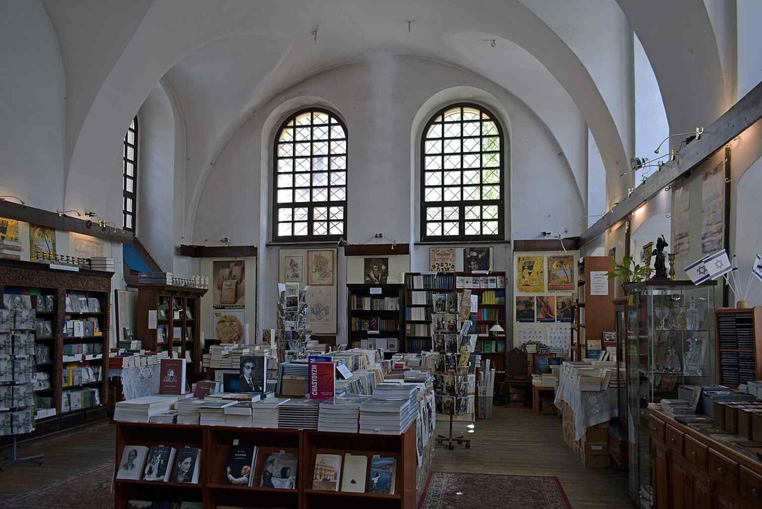 The interior of the former prayer hall, where traces of its synagogue past survive despite later reuse.