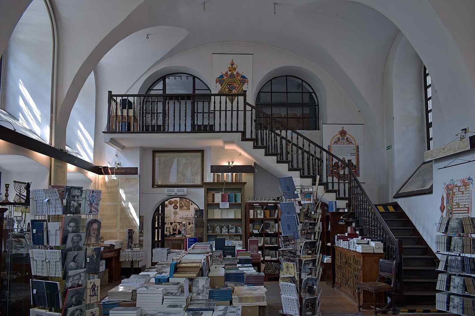 Another interior view, showing the adapted space that once held a richly decorated Jewish house of prayer.