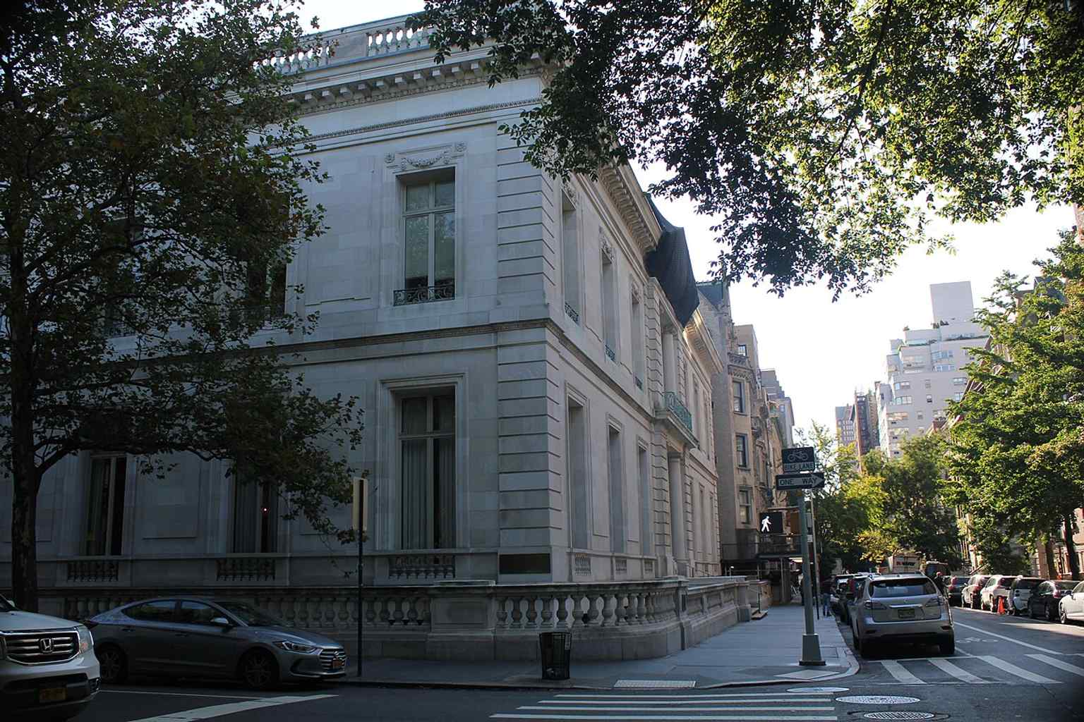 The grand limestone facade of the James B. Duke House, designed by Horace Trumbauer based on Château Labottière, was a deliberate move by James B. Duke to 'invent a past' and provide his family with an architectural pedigree.