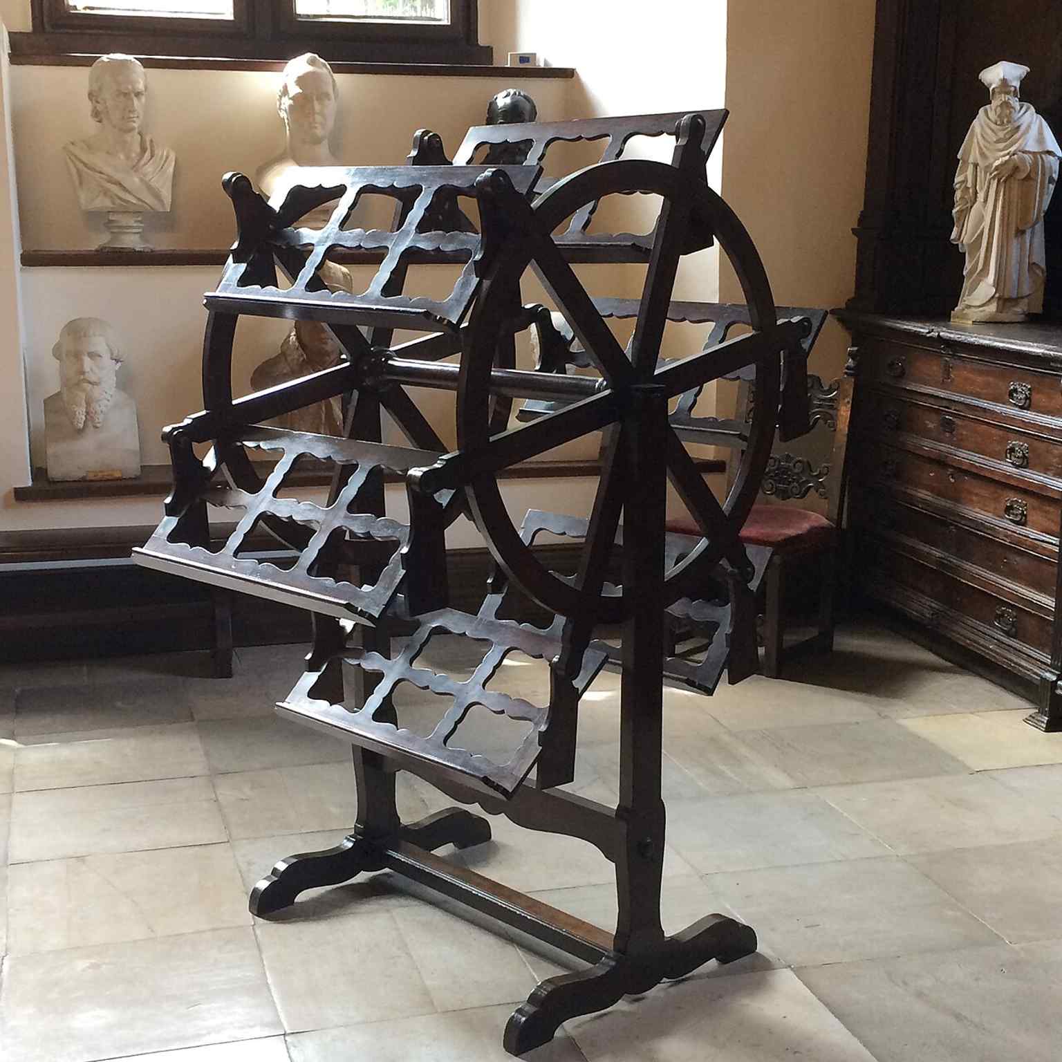 The bookwheel in the museum recalls Collegium Maius as a center of scholarship, libraries, and learned tools.