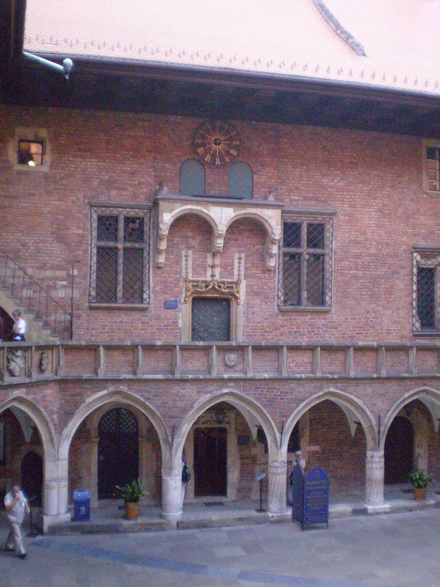 The courtyard clock is one of the landmark features of Collegium Maius, famous for its moving figures and academic song at set hours.
