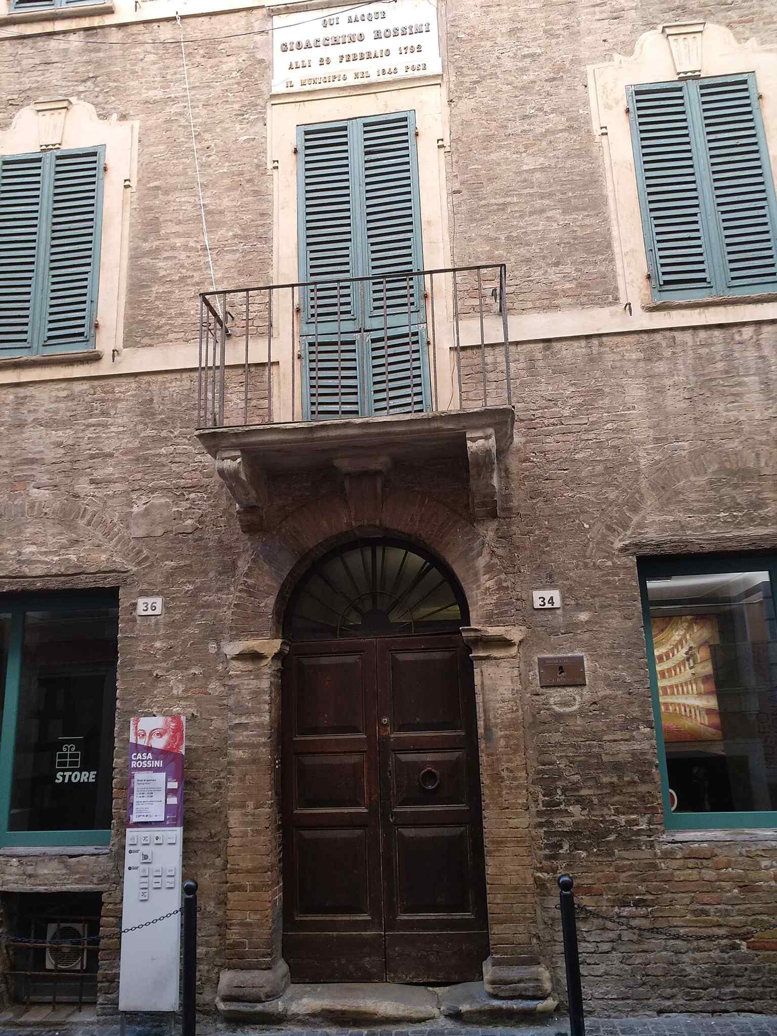 Street-level view of Rossini House in Pesaro, the birthplace of Gioachino Rossini, later turned into a museum in 1892.