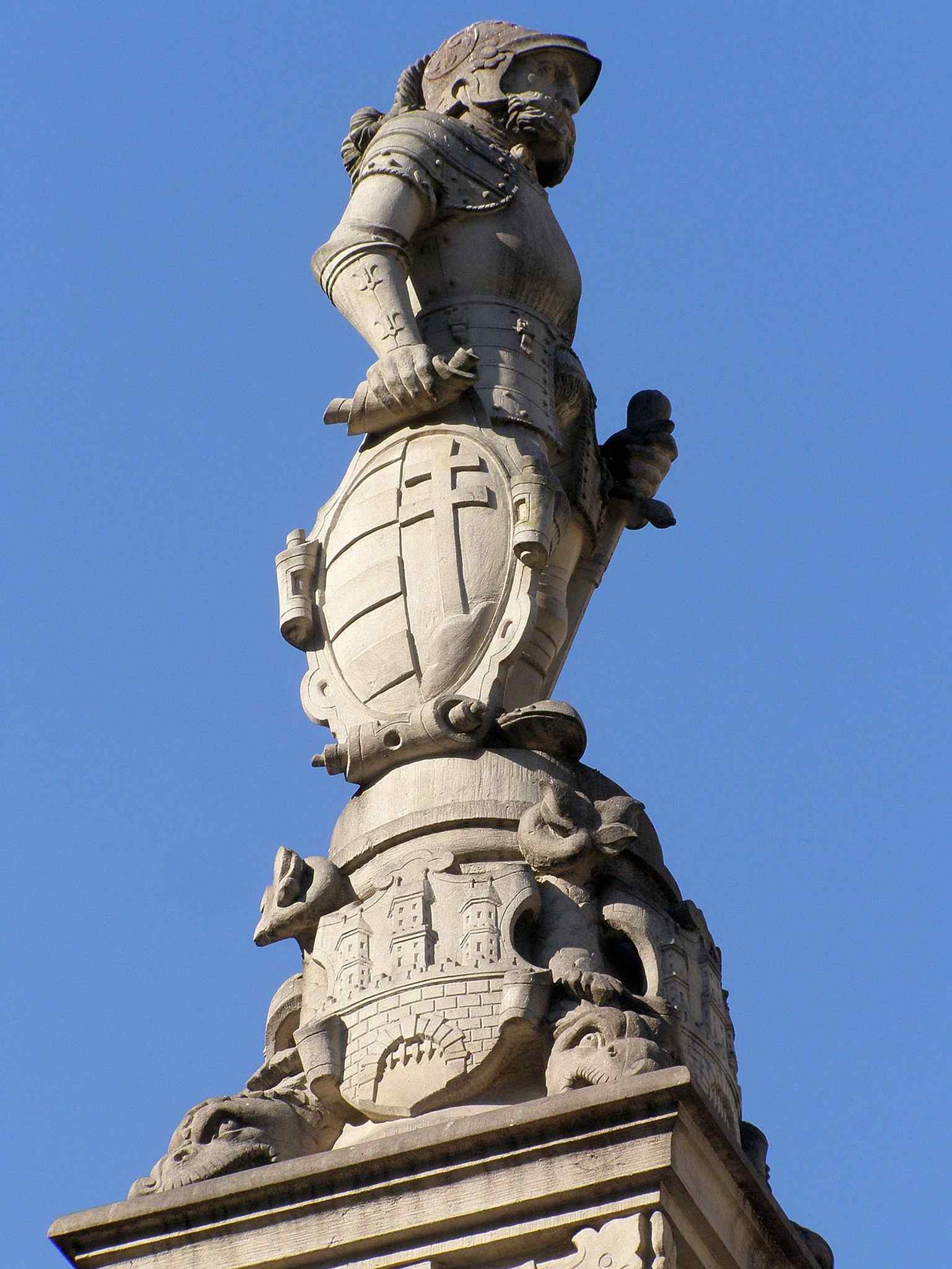 Detail view that likely captures the heraldic side of the fountain—fitting for the inscriptions and royal symbolism described in the source.