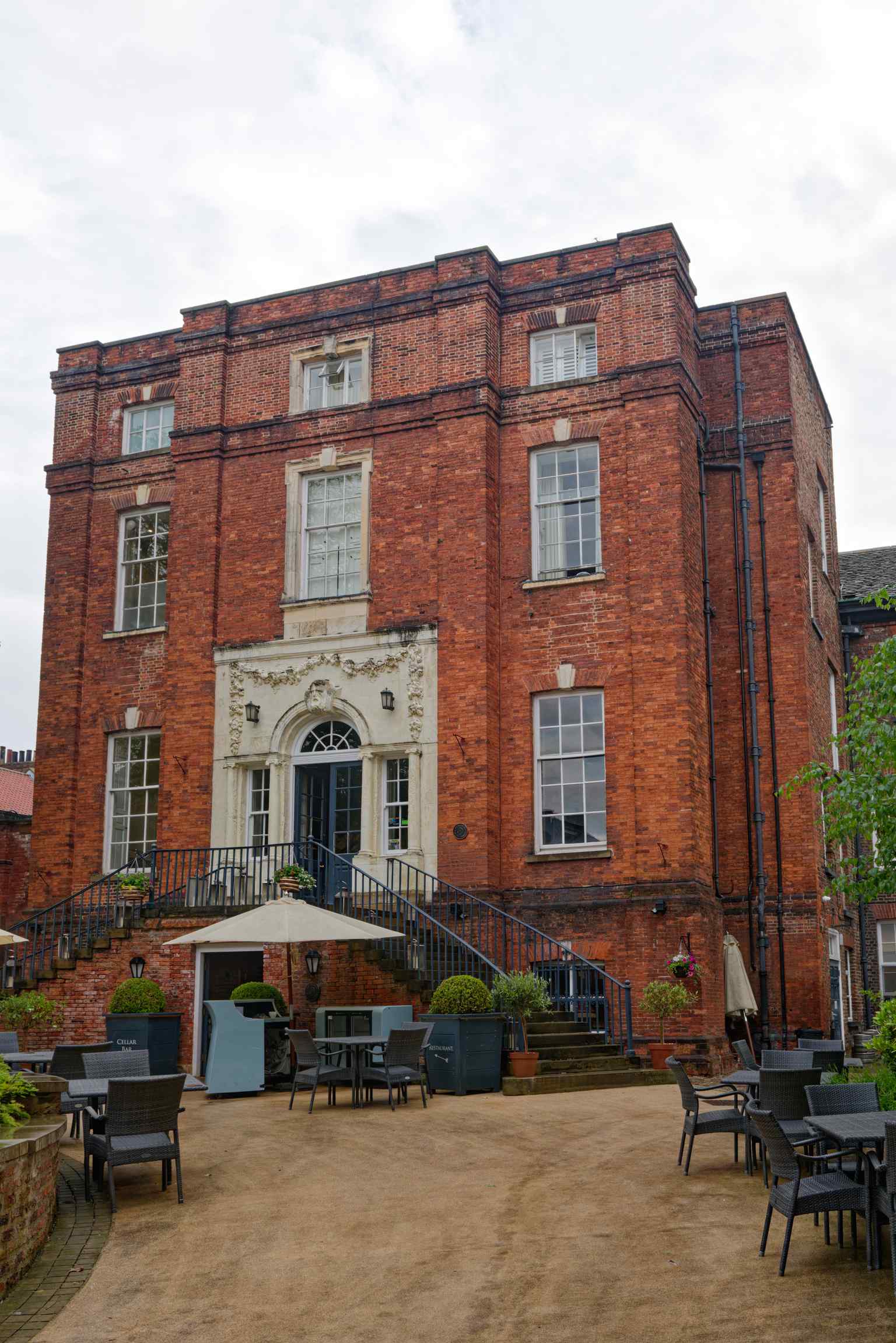 The classical Georgian facade at 9 Lendal, hiding ancient Roman and medieval foundations beneath its cellars (2024).