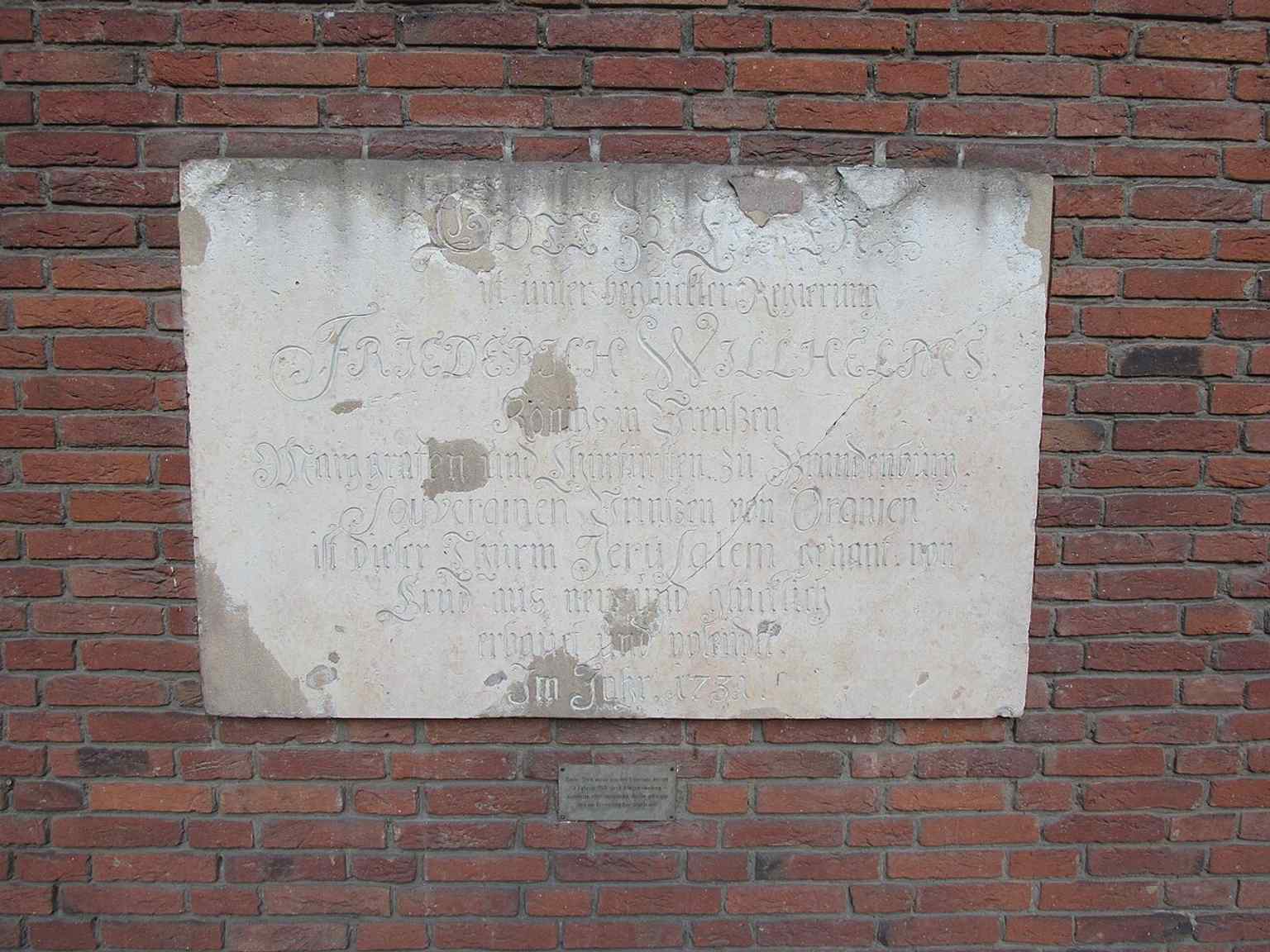 The foundation stone of the church’s 1968 rebuild, marking the postwar return of Jerusalem Church on Lindenstraße.