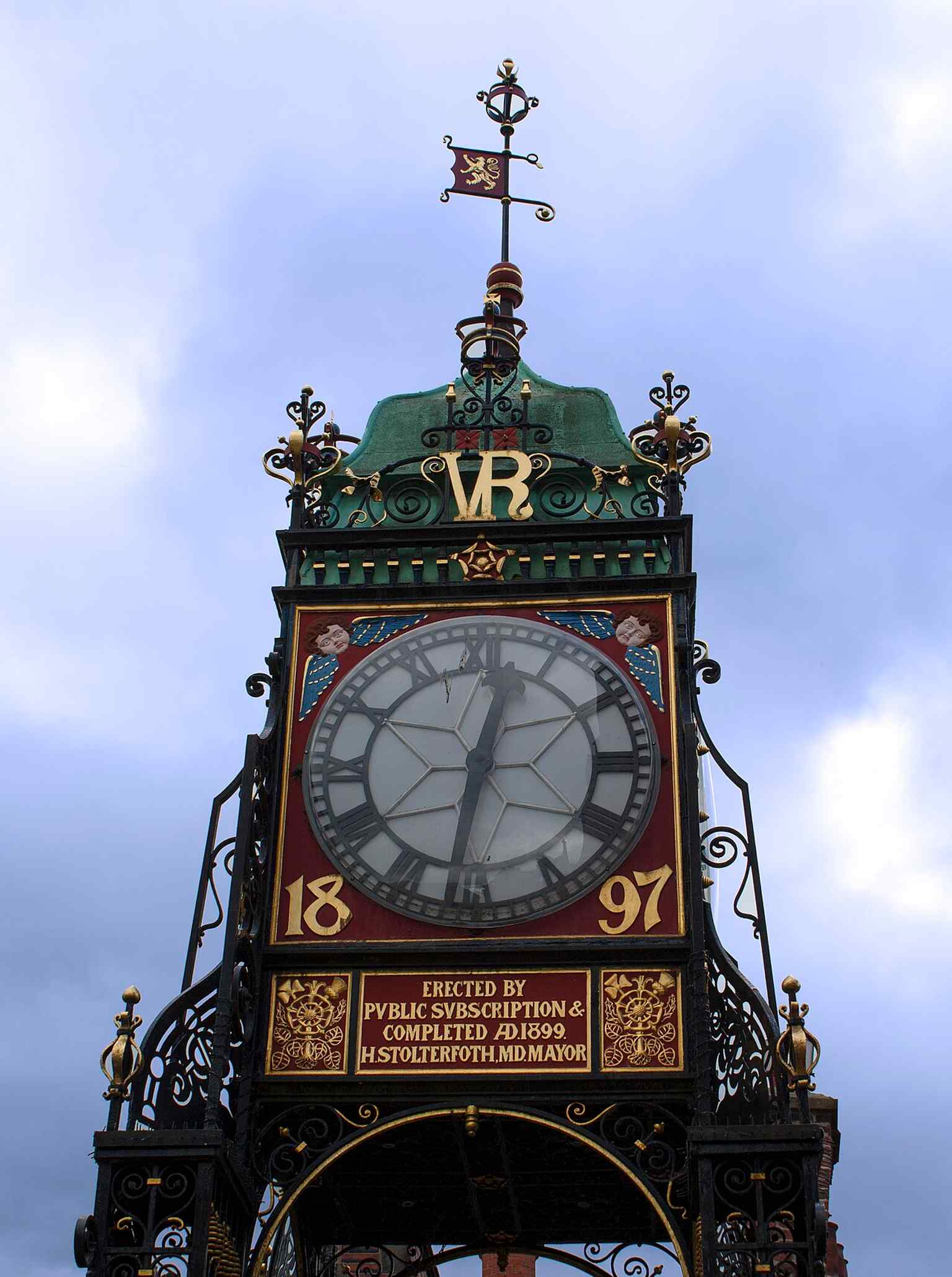 An intimate close-up of Eastgate Clock, ideal for revealing the decorative iron support and the polished clock face that made it a local icon.