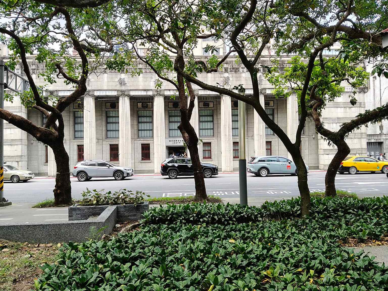 The former Bank of China-style bank hall turned museum, now part of the National Taiwan Museum, preserves the building’s imposing 1930s façade and historic presence in Taipei’s station district.