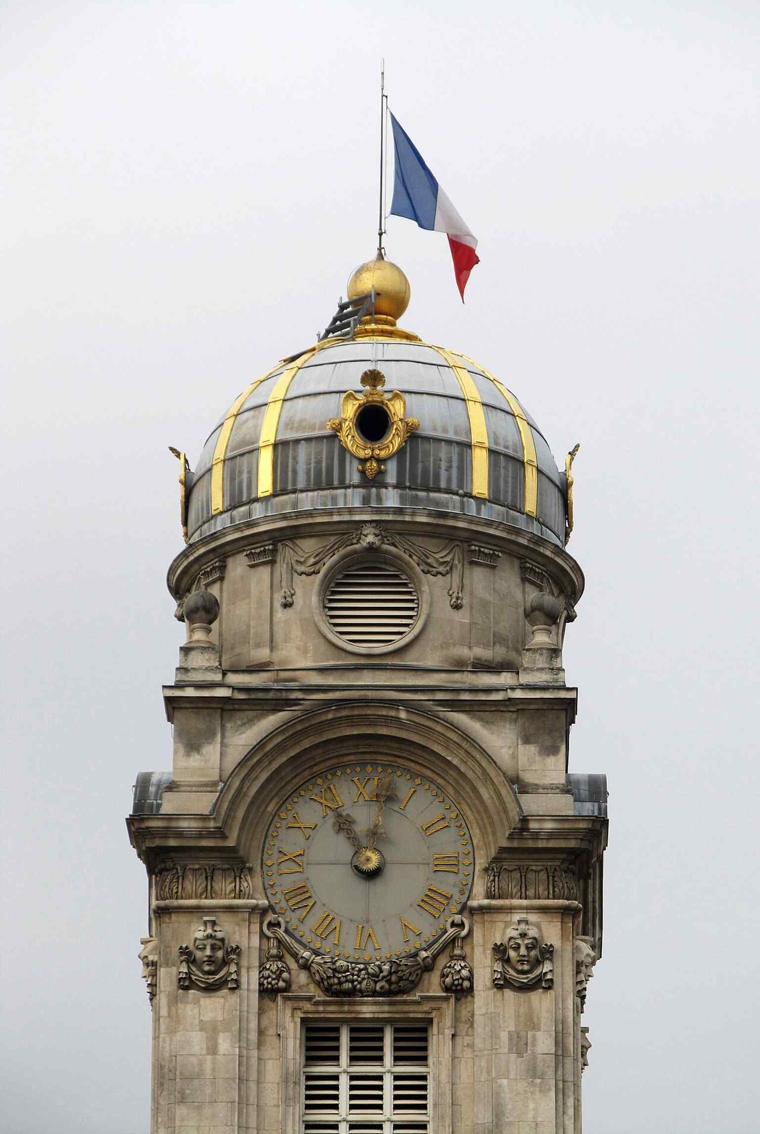 The belfry by Mansart, part of the restored skyline after the great fire, later recognized in the UNESCO Belfries of Belgium and France group.