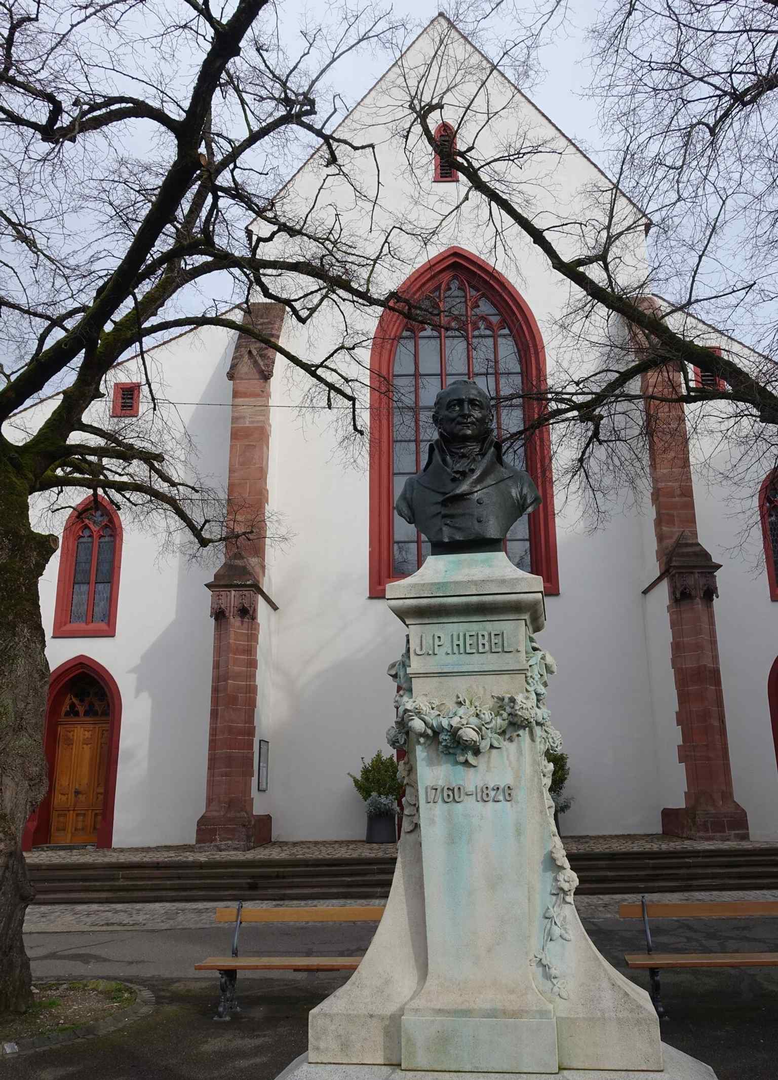 The bronze bust of Johann Peter Hebel outside St. Peter’s Church, commemorating the poet who was baptized here in 1760.