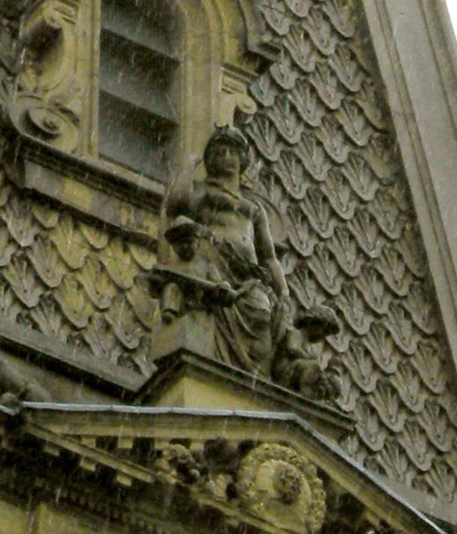 A close look at the statue of Asia on the spire, one of the four continent figures carved for the tower and completed under Daniel Maclise’s supervision.