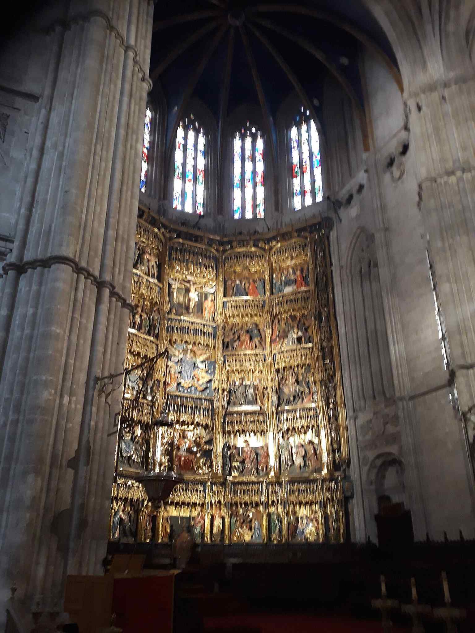 Another interior angle emphasizing the cathedral’s soaring arches and the atmosphere of the main worship space.