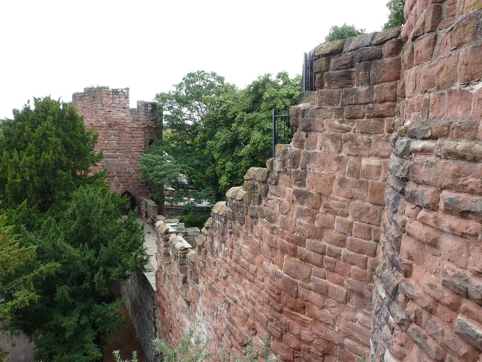 The spur wall leading up to the Water Tower — the same medieval link that connects it to Bonewaldesthorne’s Tower.