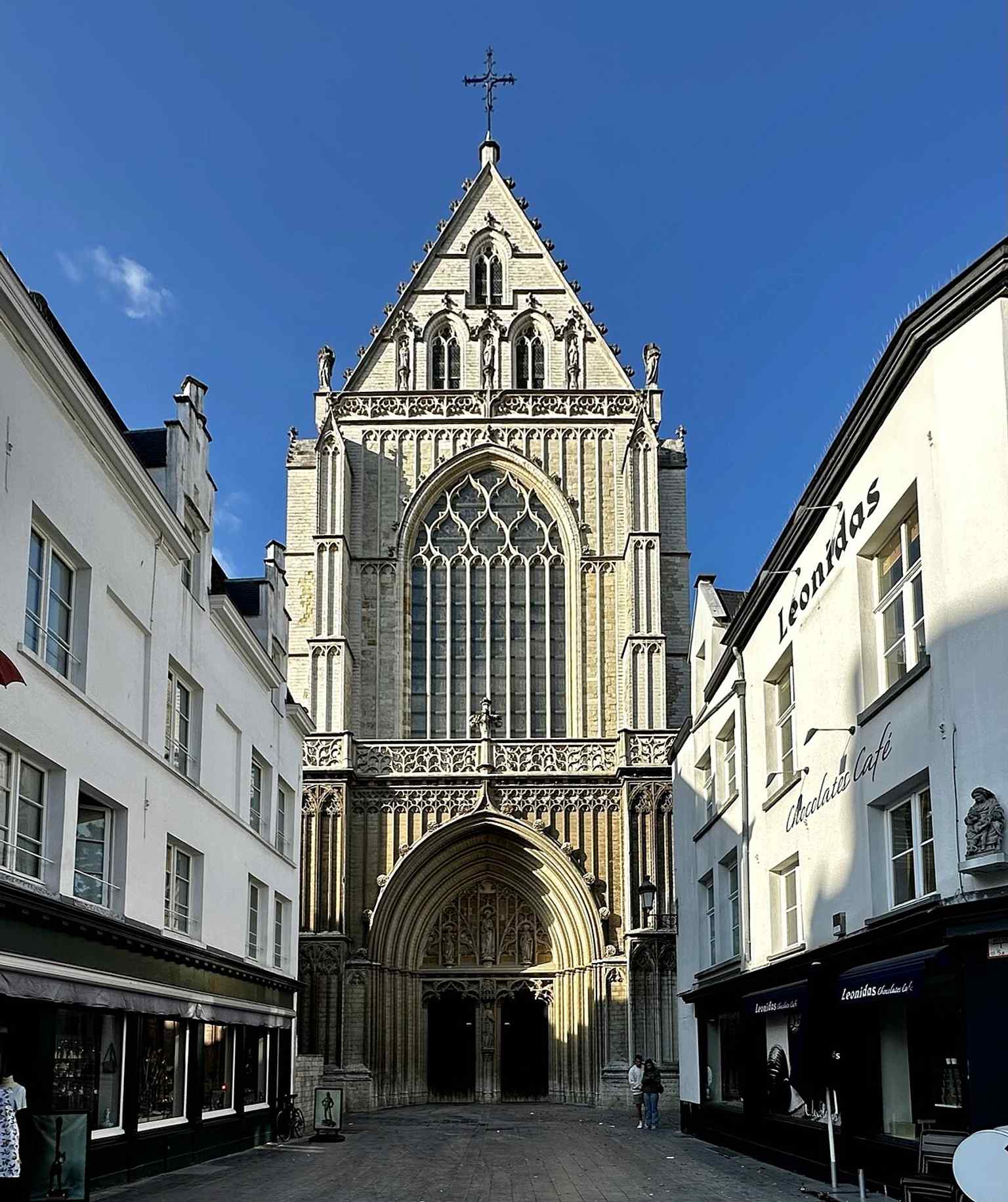 The entrance to the cathedral, where visitors can find the famous wrought-iron wellhead tied to the Quinten Matsys legend.