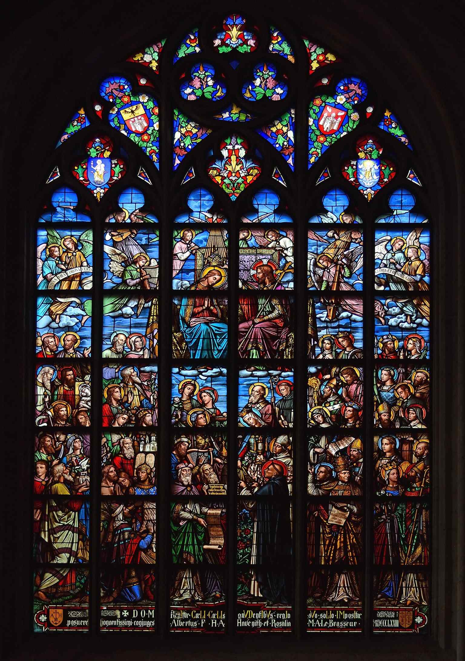 One of the cathedral’s stained-glass windows, part of the rich interior light that fills the Gothic nave.