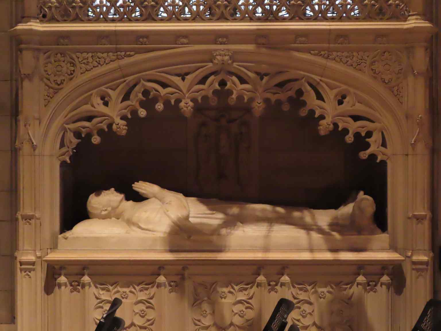 This cenotaph honors Morgan Dix, a long-serving Rector of Trinity Parish whose body lies beneath the chapel's altar, a testament to his legacy.
