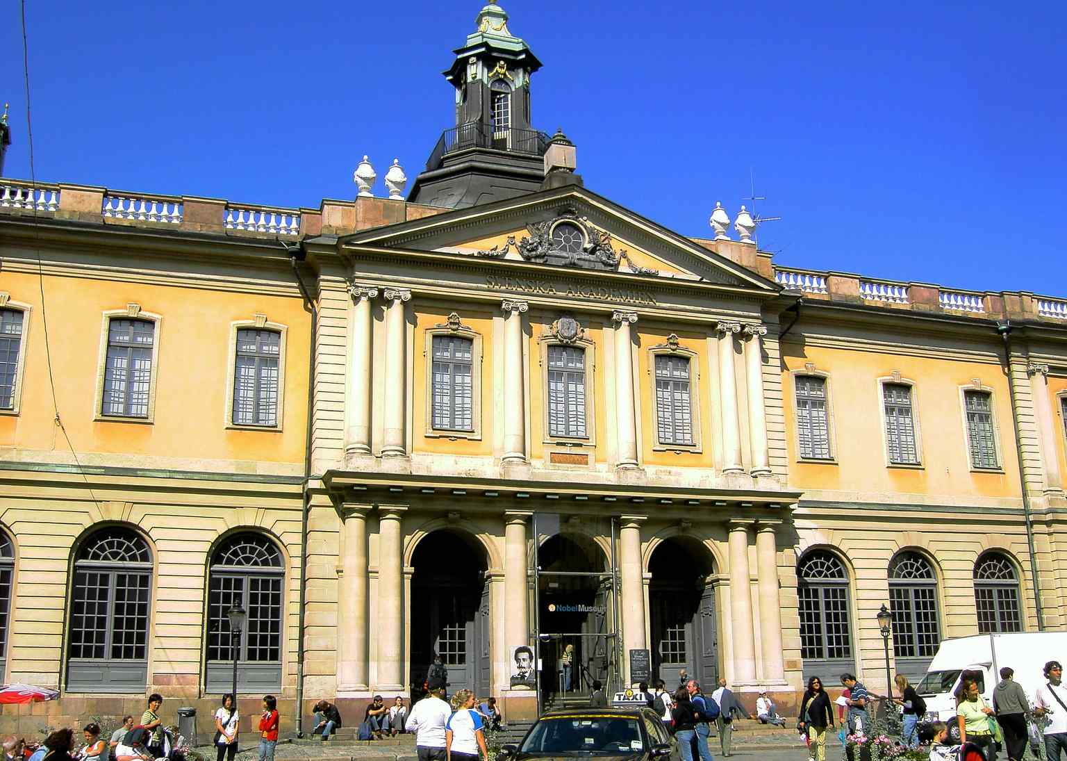 This exterior view of Börshuset, built 1773–1778, now houses the Nobel Museum and the Swedish Academy, transforming a site historically associated with medieval punishments into a center of culture.