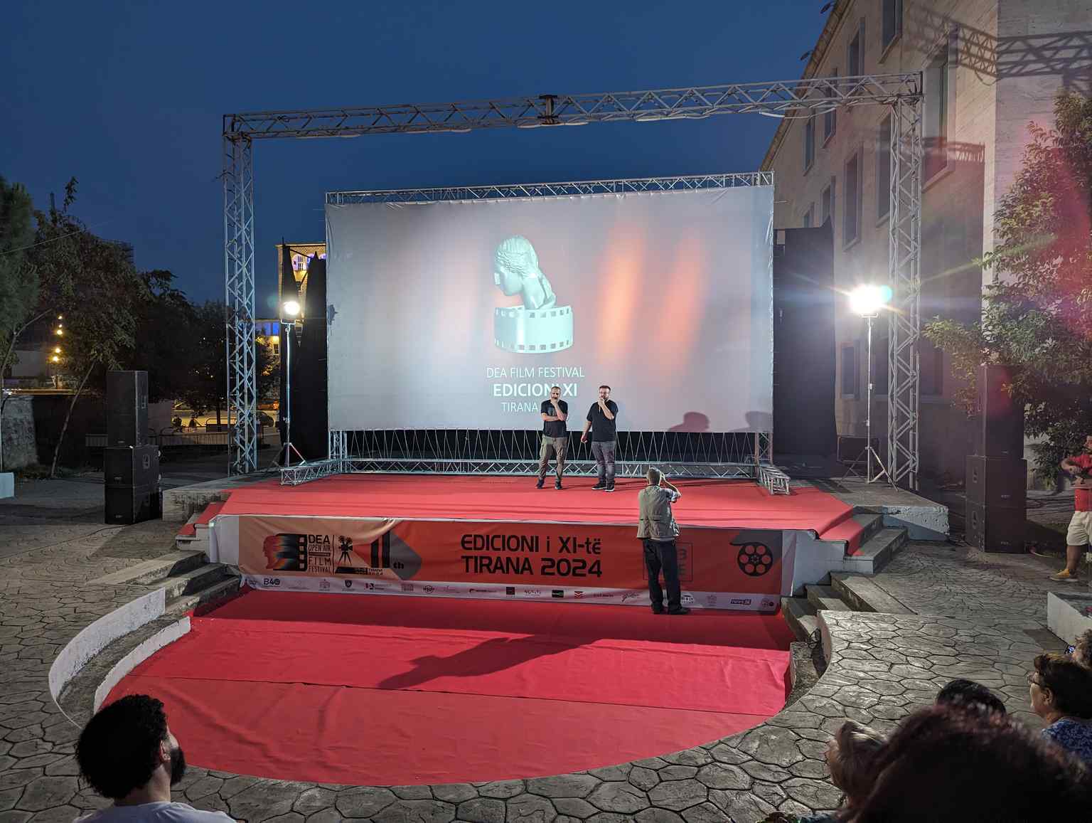 An open-air film festival is held in the University of Arts amphitheater, showcasing contemporary student and faculty activity in 2024.