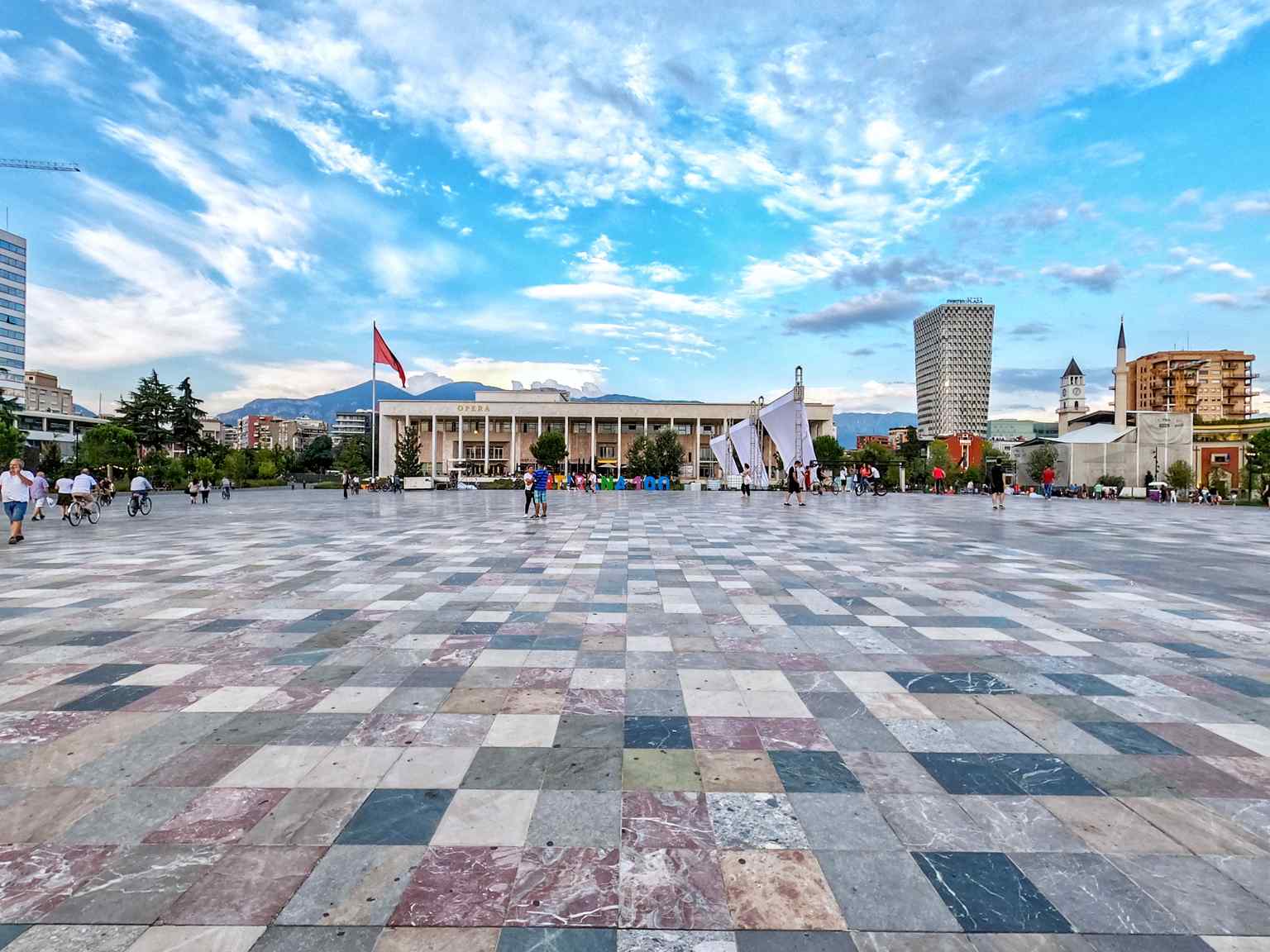 The Palace of Culture of Tirana, home to the National Library and Opera, completed in 1963, exemplifies communist-era architecture in Eastern Europe.