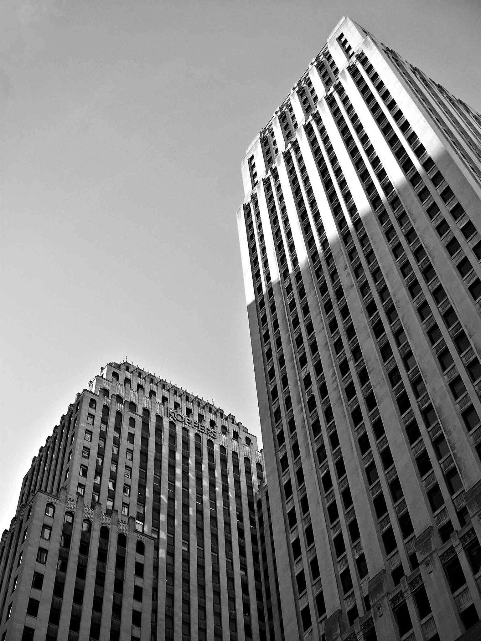 This upward view highlights the tower's 177.4-meter height and distinctive Art Deco architecture that makes it a recognizable feature of downtown Pittsburgh.