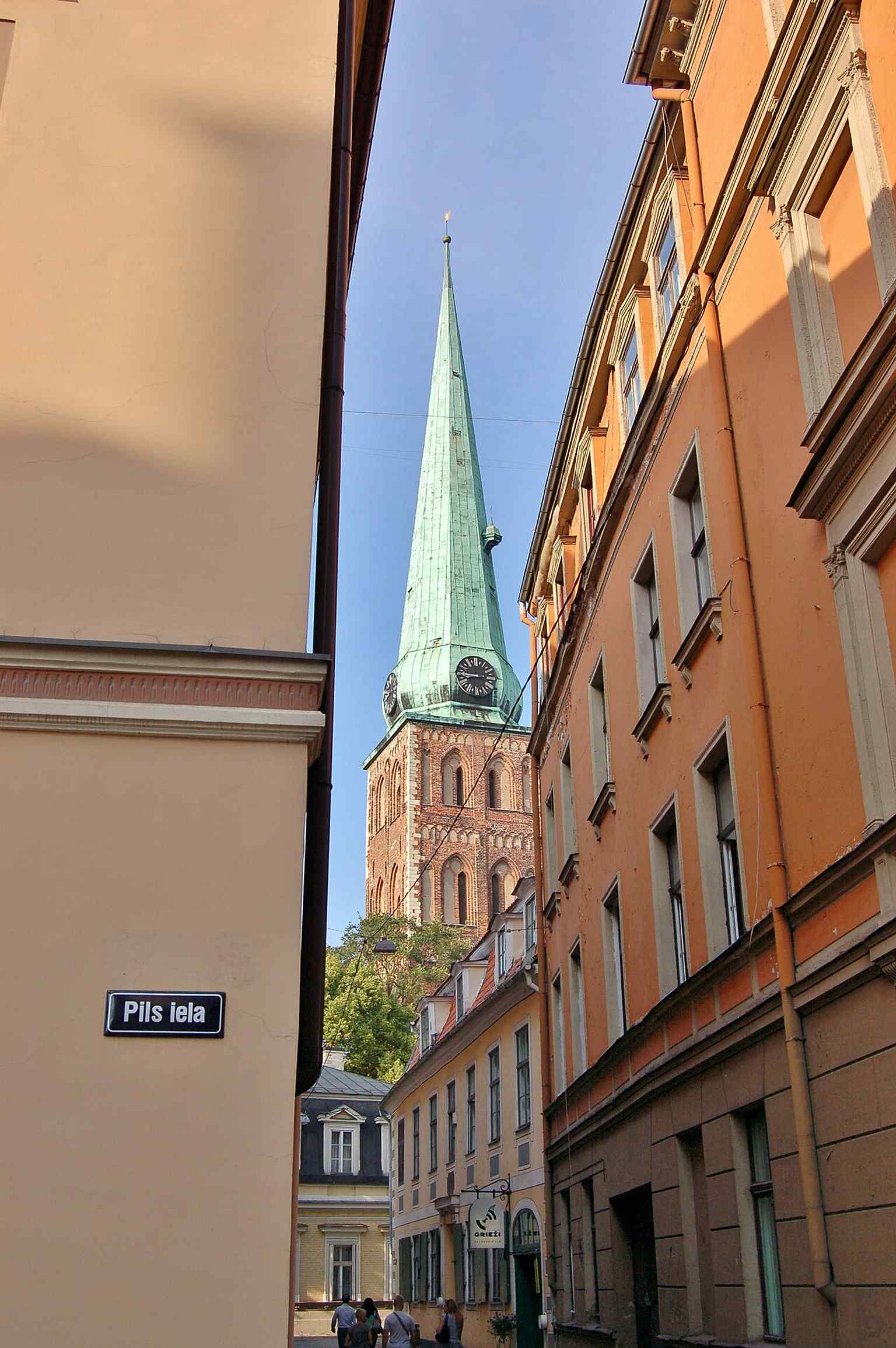 Another exterior angle of the cathedral, helping cover its brick Gothic massing and urban streetscape.