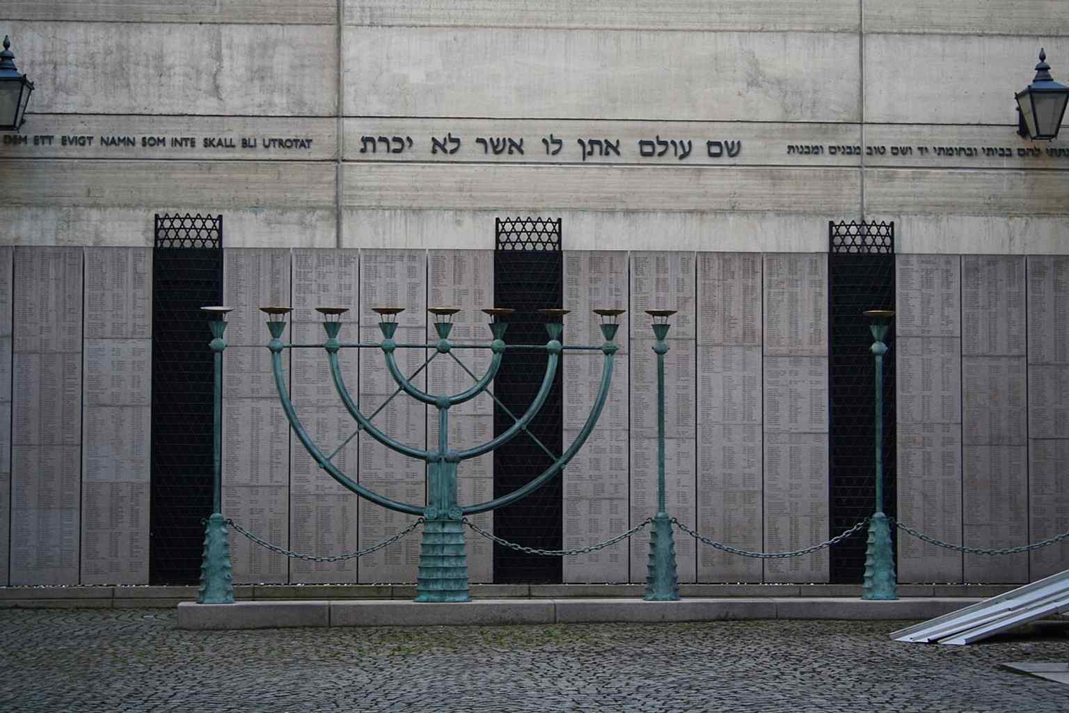 The striking Holocaust memorial wall, a 42-meter structure, serves as a symbolic tombstone for over 8,500 relatives of Swedish Jews who perished.