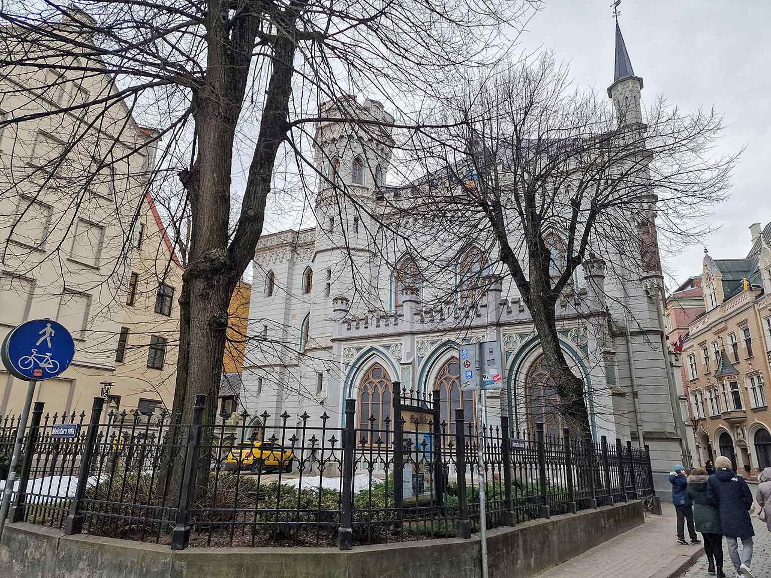 A clear street-level view of the Small Guild building, opposite the Great Guild on Livs Square, showing its historic civic presence.