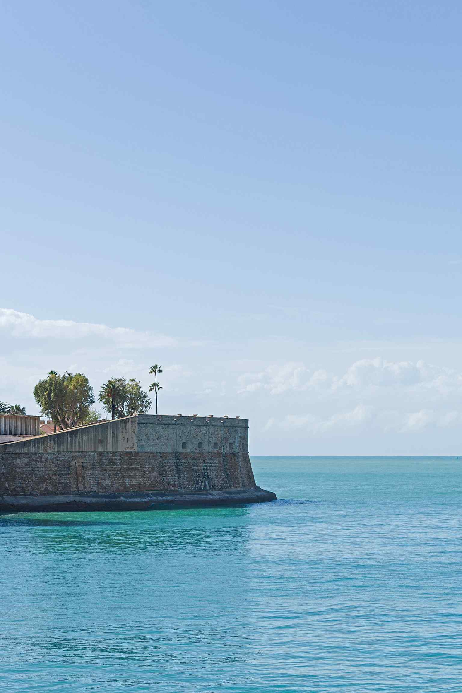 An elevated view of the bastion from Alameda Apodaca, highlighting the strong sea-facing walls that made it both a fortress and a breakwater.