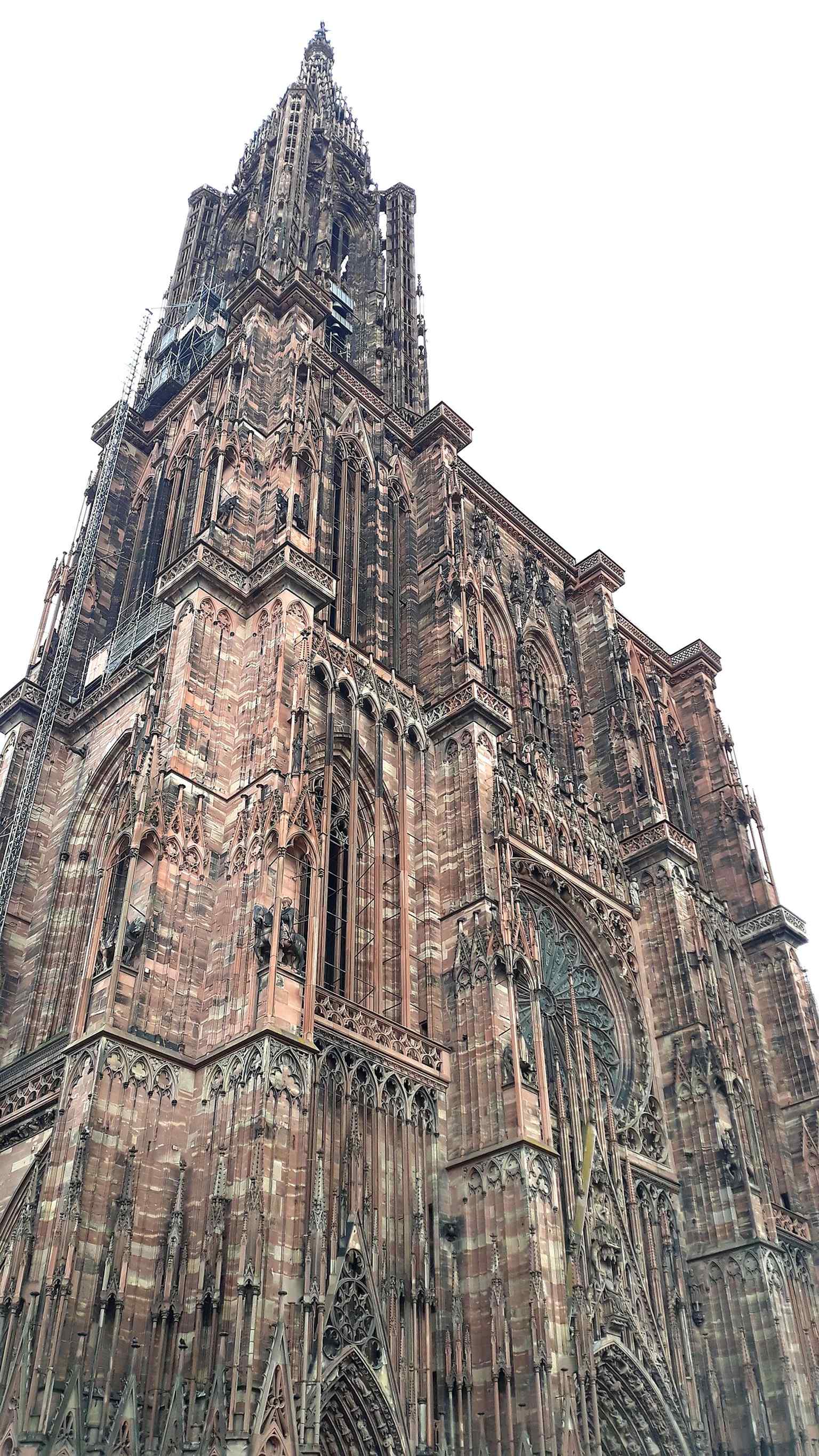 A northwest exterior view that shows the cathedral rising above the old city fabric, matching the text’s emphasis on how tightly it is embedded in Strasbourg’s historic center.