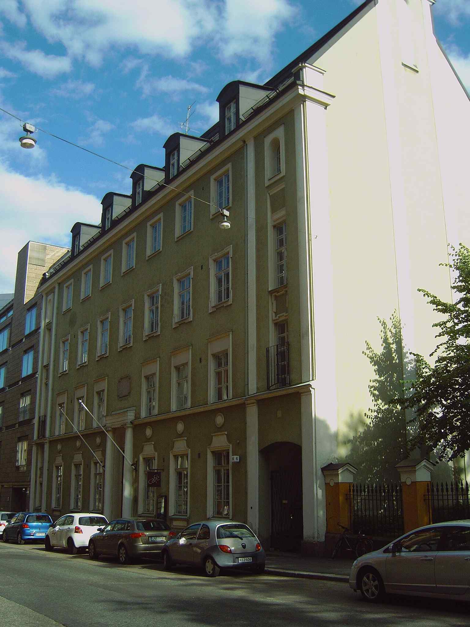 The main façade of the House of Science and Letters on Kirkkokatu, still showing the elegant 1920s classicist look designed by Elsa Arokallio.