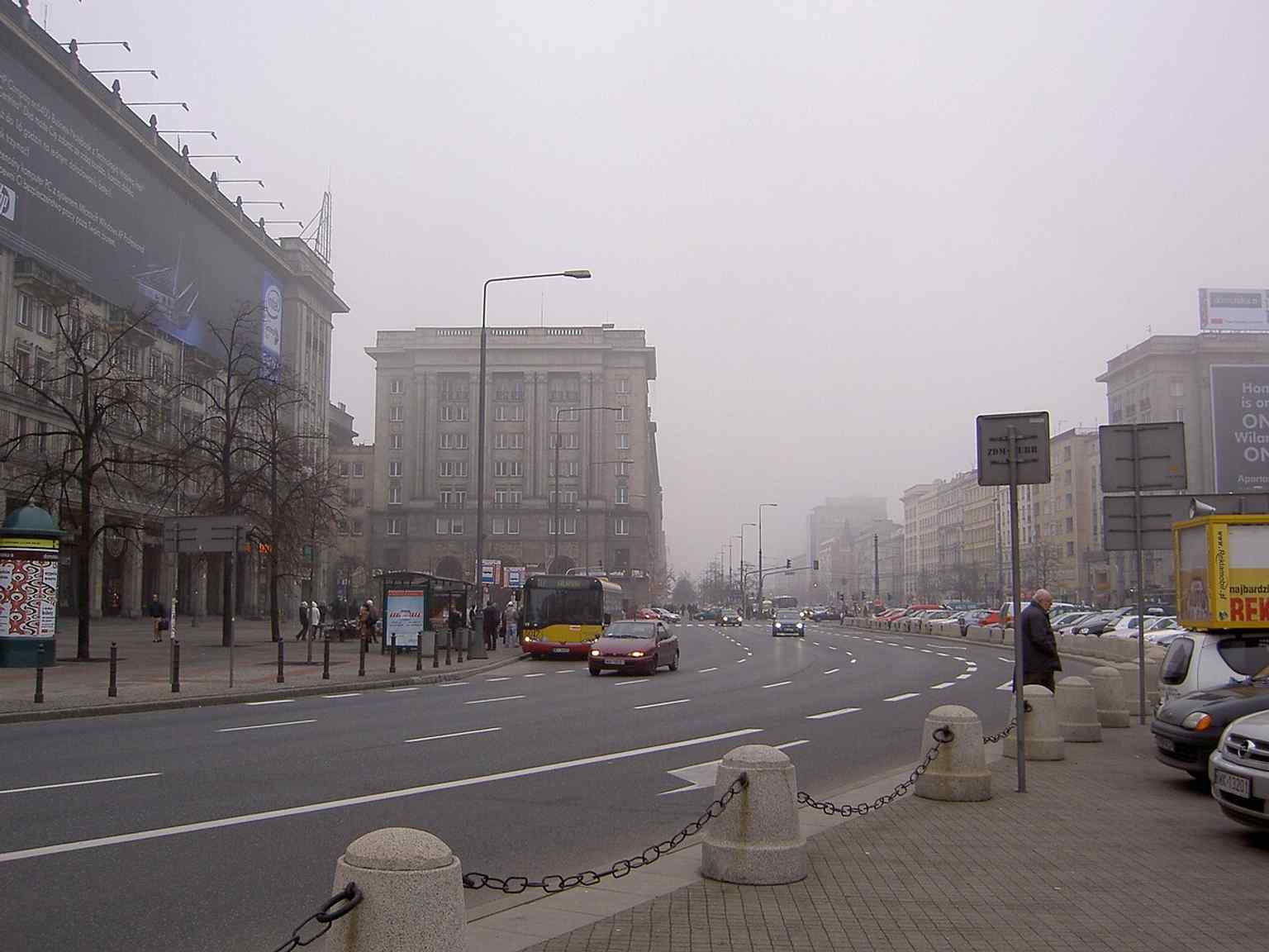 A wide view of Constitution Square’s monumental façades and open roadway, typical of the socialist-realist design.