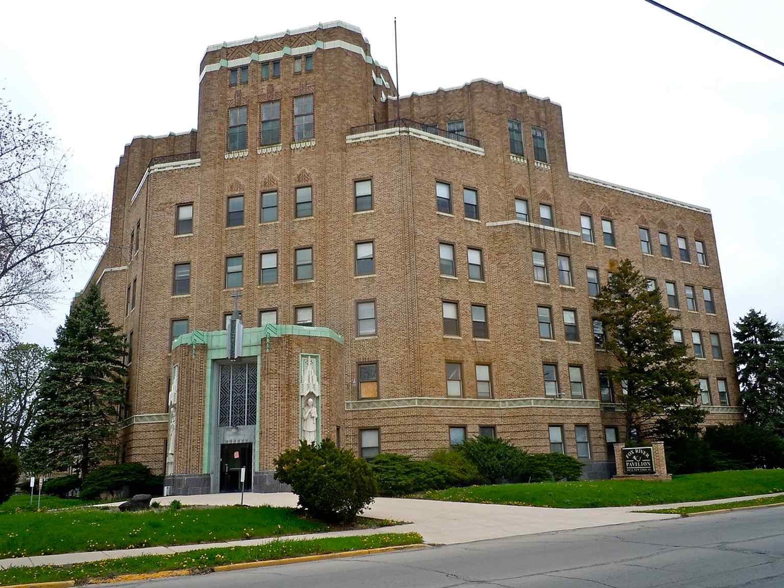 The vacant St. Charles Hospital building on East New York Street, which later became Fox River Pavilion and was added to the National Register in 2010.